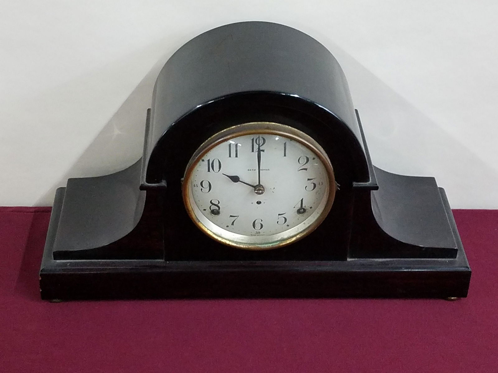 Seth Thomas Mantle Clock: Starts and stops. 16-1/4" wide 9-1/2" high. Some losses to clock finish. IMPORTANT: Before bidding, please read the terms and conditions below. When you registered for the auction you agreed to these