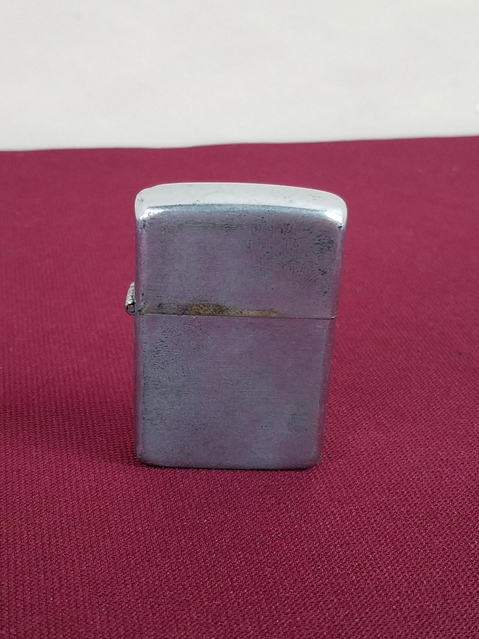 3 Barrel Zippo Lighter: 1-1/2" wide x 2-3/4" high. IMPORTANT: Before bidding, please read the terms and conditions below. When you registered for the auction you agreed to these terms and will be required to comply with them