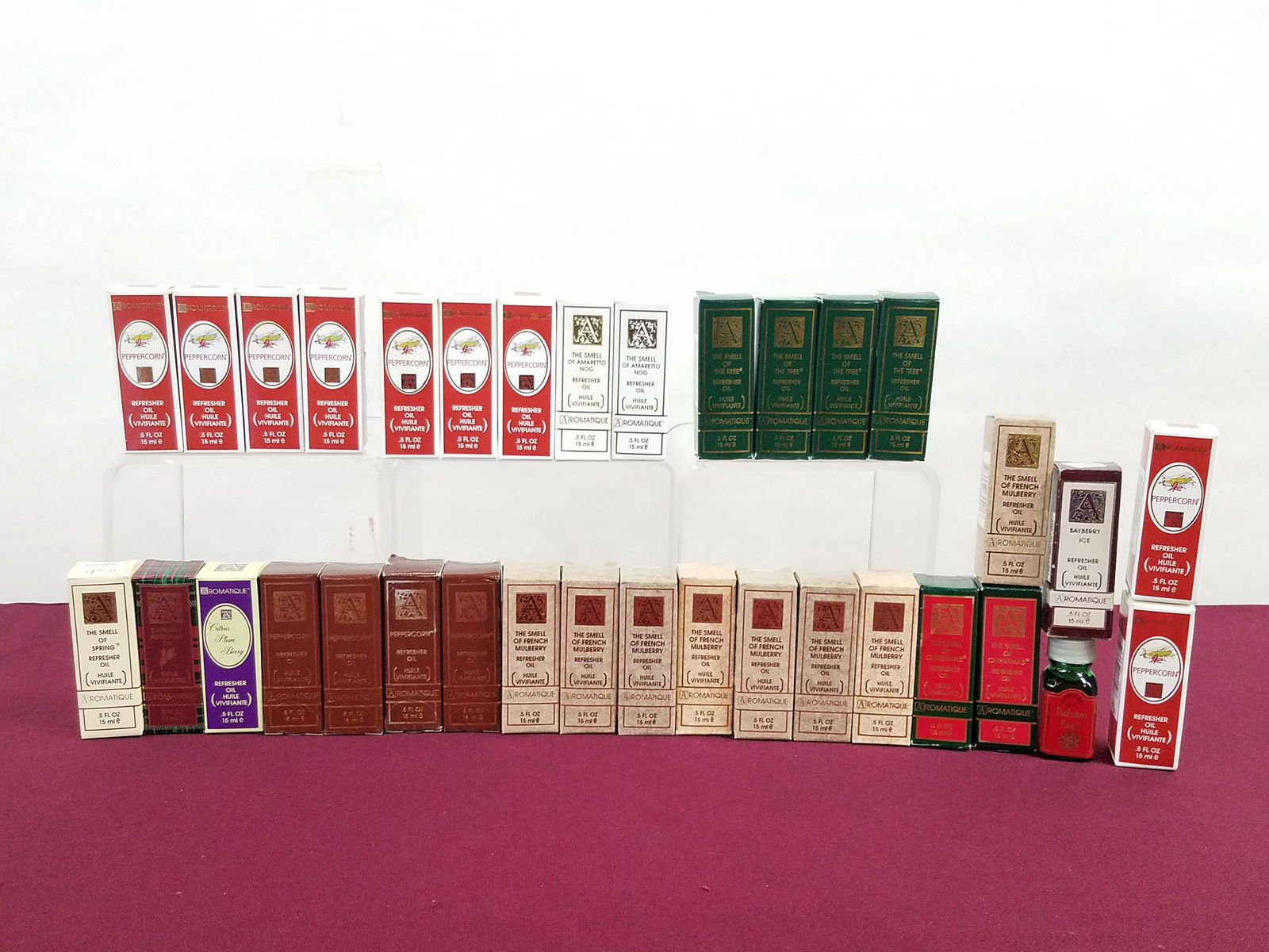 34 Aromatique Refresher Oils: Includes Peppercorn, The Smell of The Tree, Bayberry, Citrus Plum Berry, French Mulberry, The Smell of Christmas and The Smell of Amaretto nog. IMPORTANT: Before bidding, please read the terms and con