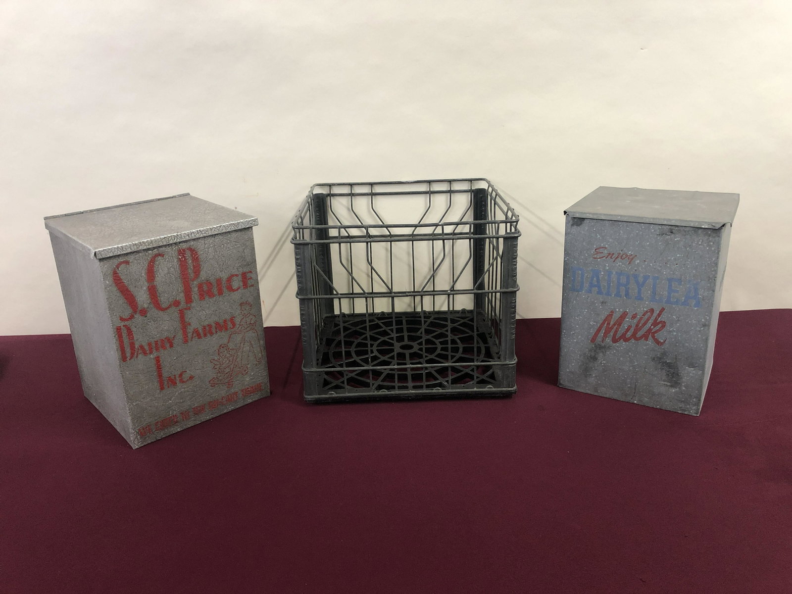 2 Milk Boxes and Milk Crate: One milk box from S. C. Price Dairy Farms Inc and other from Dairyland Milk. Crate from Hazelton Farmers. Overall crates 8 1/2" wide x 11 1/2" high; crate 12 1/2" wide x 11 1/2" high. IMPORTANT: Befor