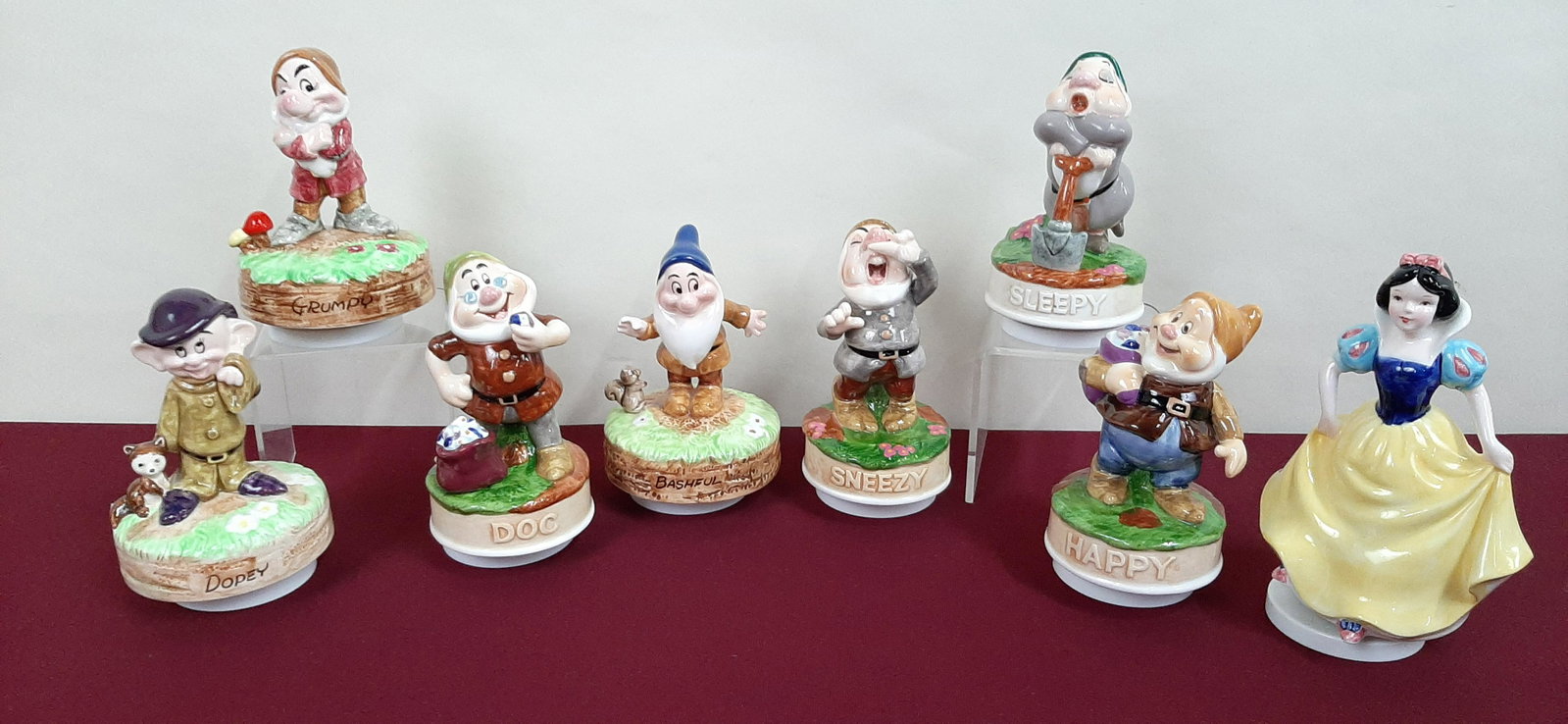 Snow White and the Seven Dwarves Musical Figures: Manufactured by Schmid. Made in Japan. 4" diameter X 6 1/4" to 7 1/4" high. IMPORTANT: Before bidding, please read the terms and conditions below. When you registered for the auction you agreed to the