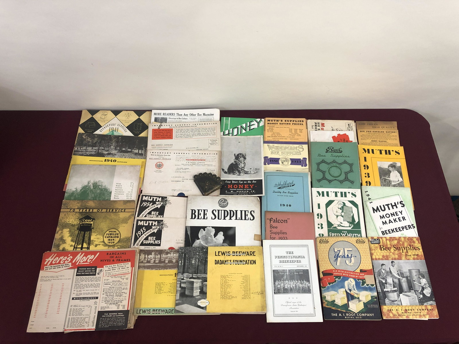 Group of 31 Books and Pamphlets on Bees: Includes pressed tin corner bookmark. 12" high x 9" wide. IMPORTANT: Before bidding, please read the terms and conditions below. When you registered for the auction you agreed to these terms and will 