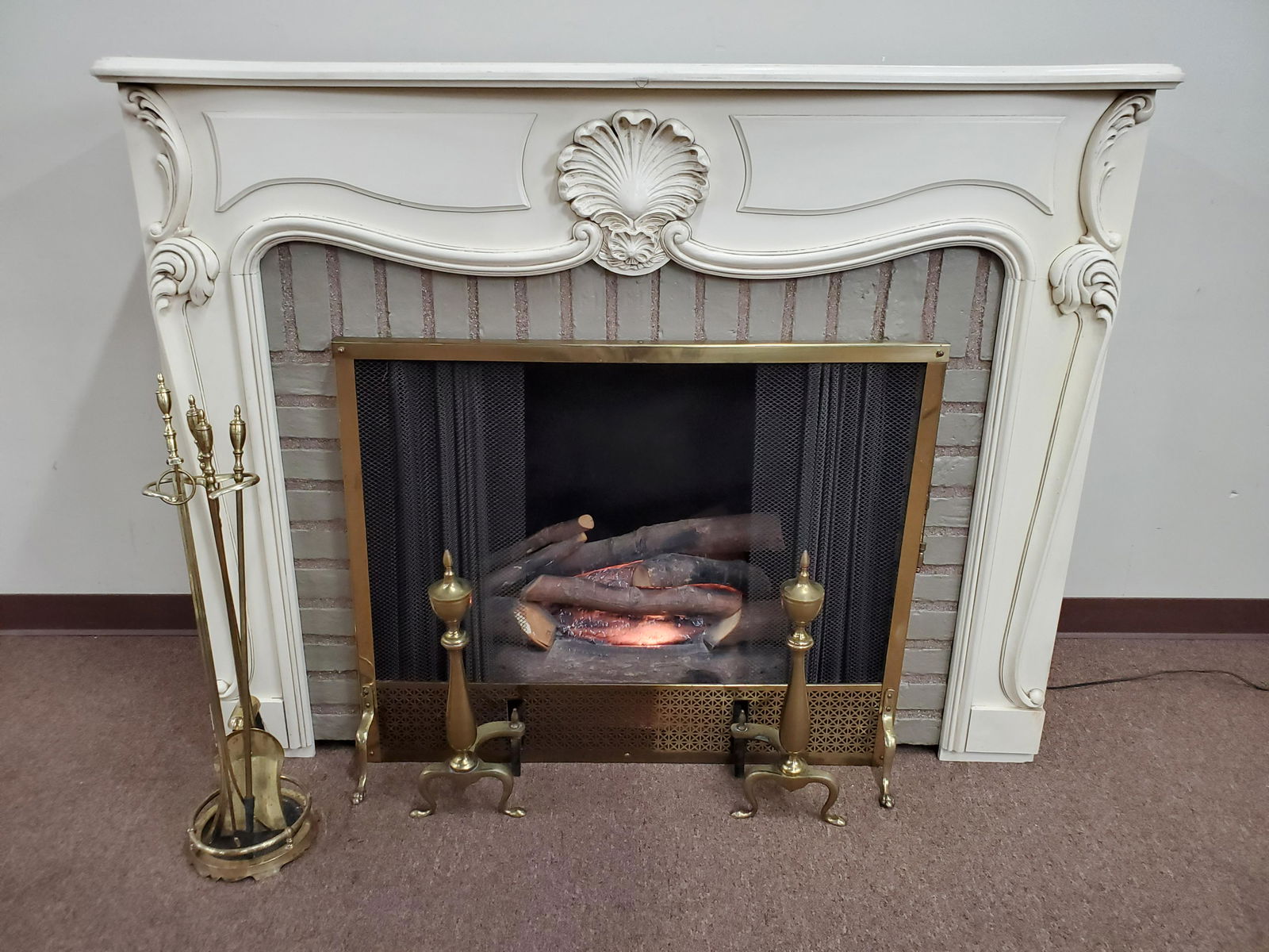 Vintage Fireplace with Logs and Lights (1 of 3)