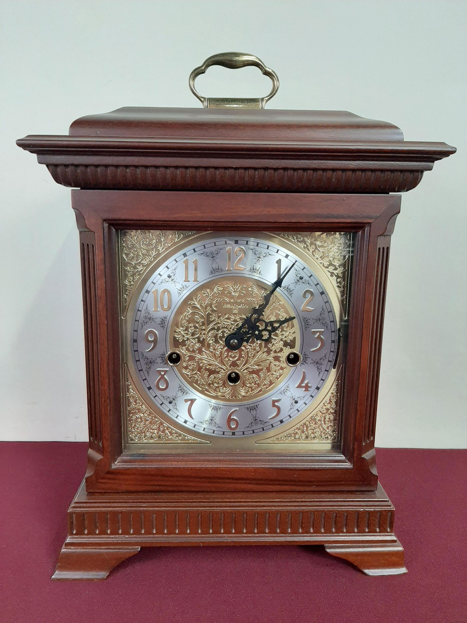 Baldwin Mantle Clock: Running. 10 1/2" wide X 7 1/2" deep 15 1/4". IMPORTANT: Before bidding, please read the terms and conditions below. When you registered for the auction you agreed to these terms and will be required t