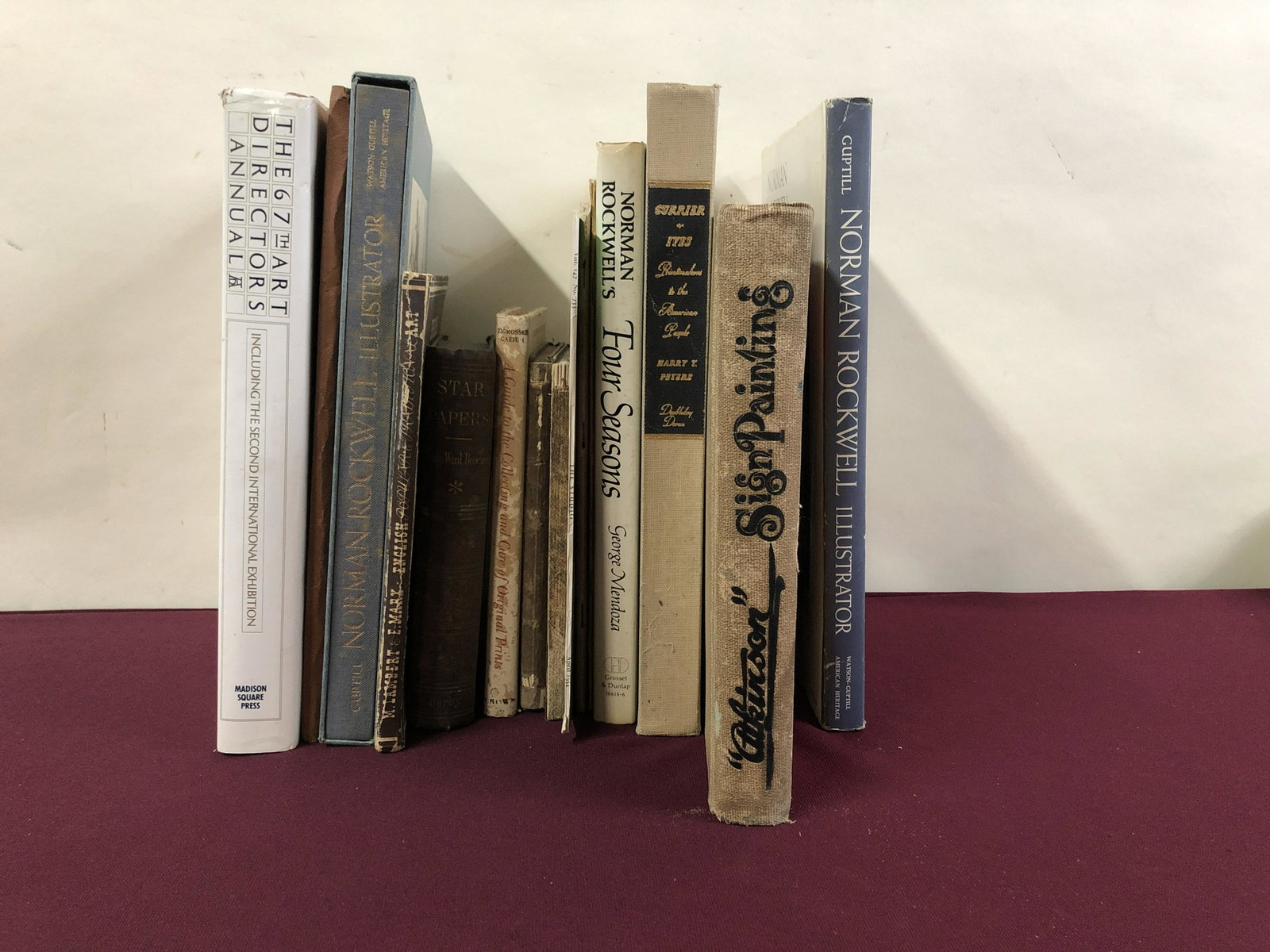 16 Books & Catalogs About Art: Includes "The 67th Art Directors Annual," "Norman Rockwell's Four Seasons," "Atkinson Sign Painting," "The Studio," and more. IMPORTANT: Before bidding, please read the terms and conditions below. Whe