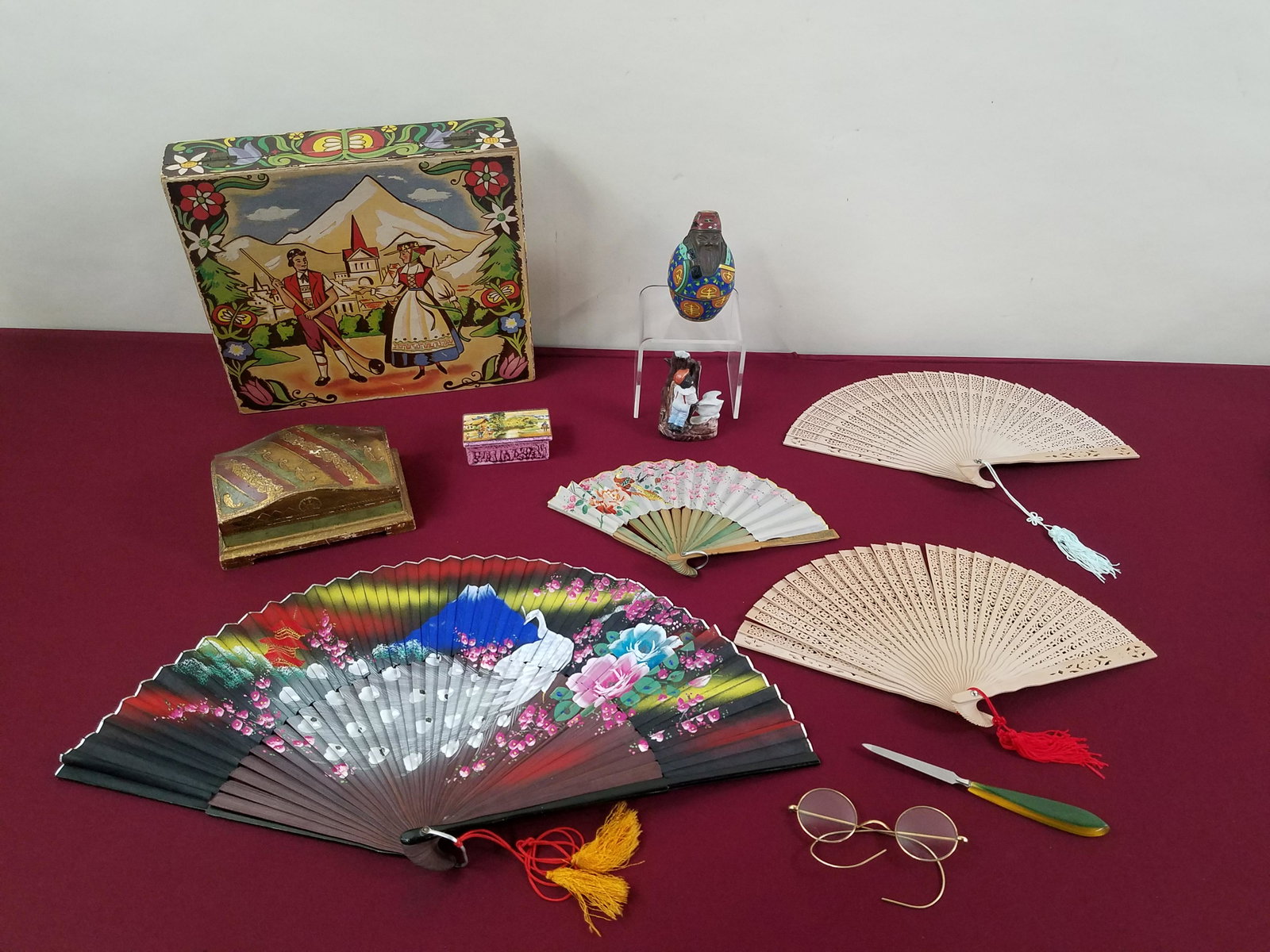11 Pcs Boxes, Fans and Glasses: Includes English ware Lancaster Sandland LTD. porcelain box, cloisonne enameled figural box, gold fill glasses, nail file and 4 fans. Fans: 7" to 12-1/4" high. IMPORTANT: Before bidding, please read t