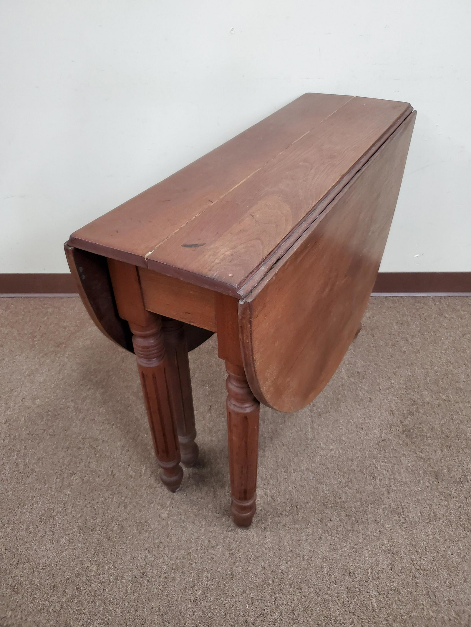 Drop Side Table: 49" wide X 36 1/2" deep X 28 1/2" high. Split in wood at center. IMPORTANT: Before bidding, please read the terms and conditions below. When you registered for the auction you agreed to these terms an