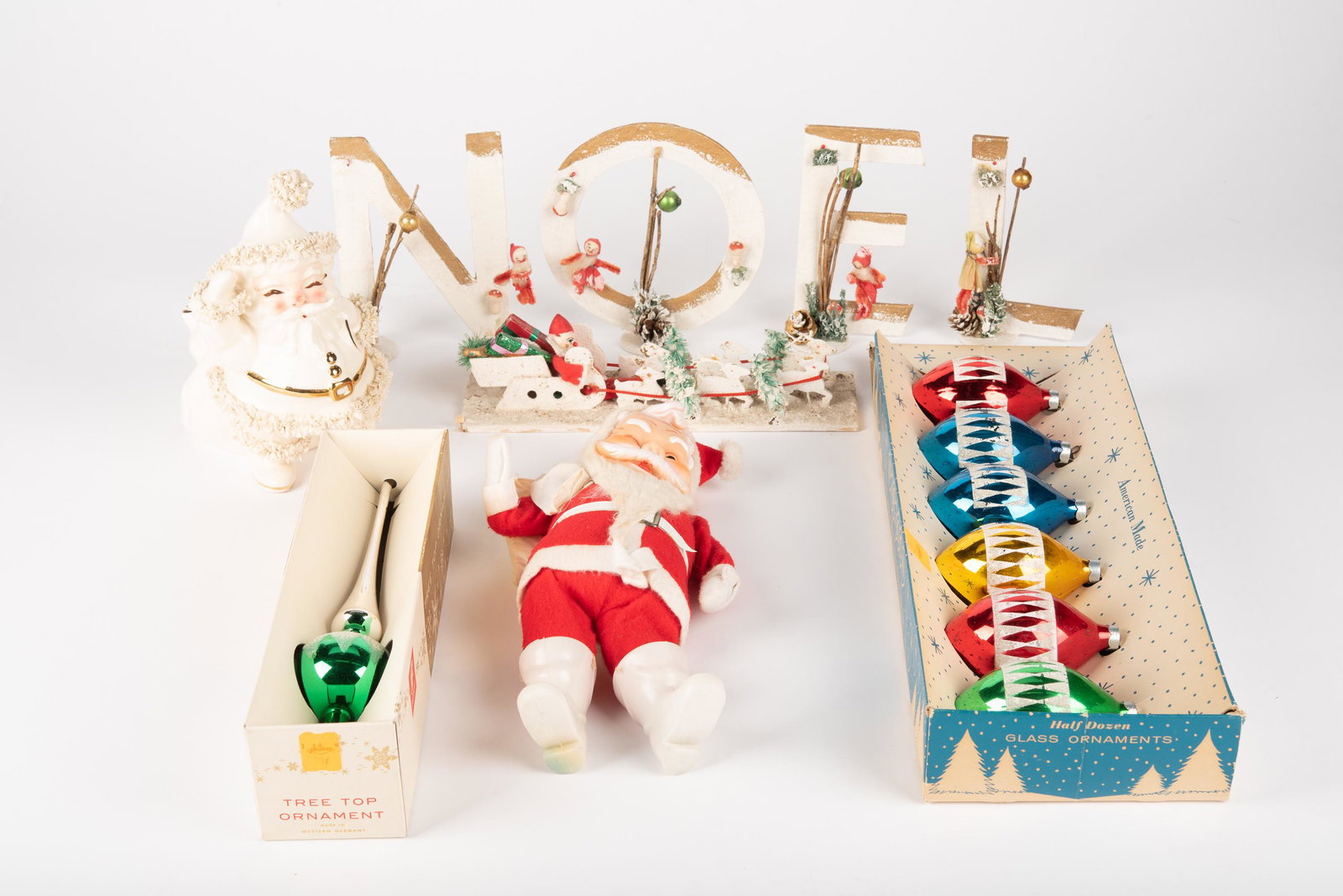 6 Pcs of Vintage Christmas: Santa Claus 12" high. IMPORTANT: Before bidding, please read the terms and conditions below. When you registered for the auction you agreed to these terms and will be required to comply with them.