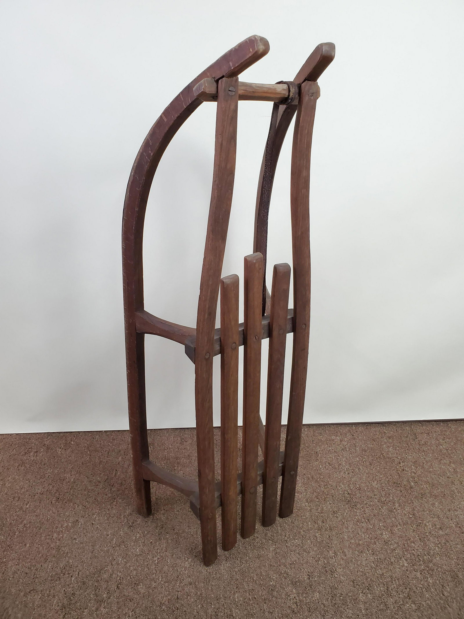 Wooden Runner Sled: 40" wide X 14" deep X 11 1/2" high. IMPORTANT: Before bidding, please read the terms and conditions below. When you registered for the auction you agreed to these terms and will be required to comply 