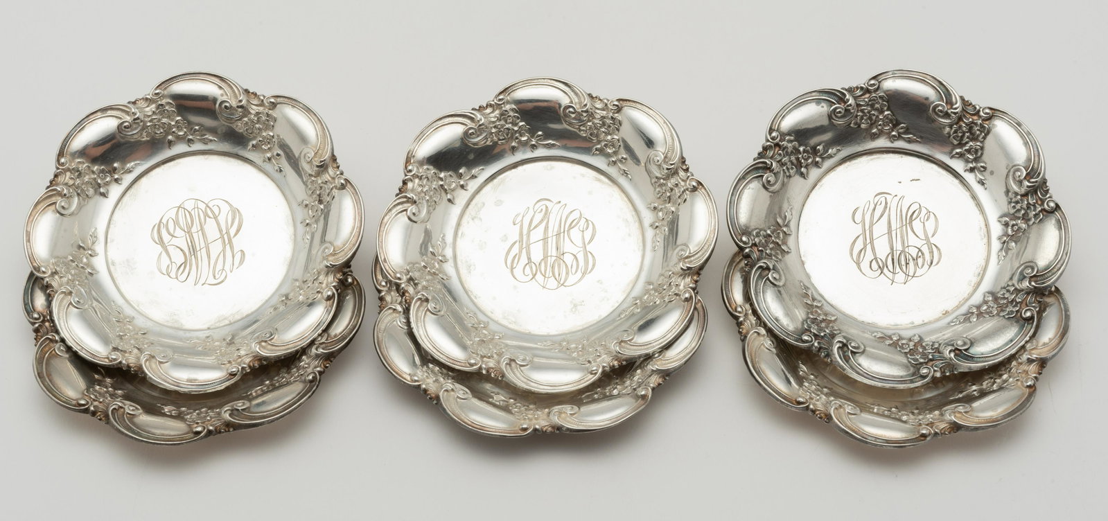6 Sterling Butter Pats: 3 1/4" diameter. 3.8 ozt. Monogrammed. IMPORTANT: Before bidding, please read the terms and conditions below. When you registered for the auction you agreed to these terms and will be required to comp