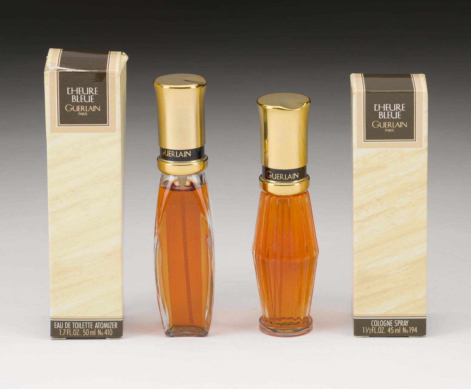 2 Boxes of Guerlain L: 5 3/4" x 6" long, 2 1/2" x 2 1/2" wide. IMPORTANT: Before bidding, please read the terms and conditions below. When you registered for the auction you agreed to these terms and will be required to com