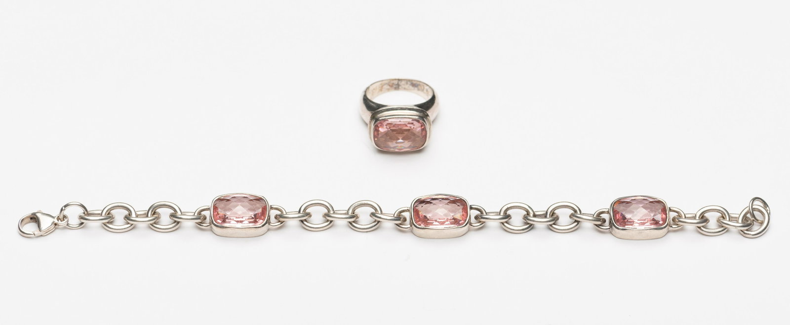 Sterling Morganite Bracelet & Ring: Stamped 925 and signed "K" in circle. Bracelet 7" long, ring size 7. IMPORTANT: Before bidding, please read the terms and conditions below. When you registered for the auction you agreed to these term