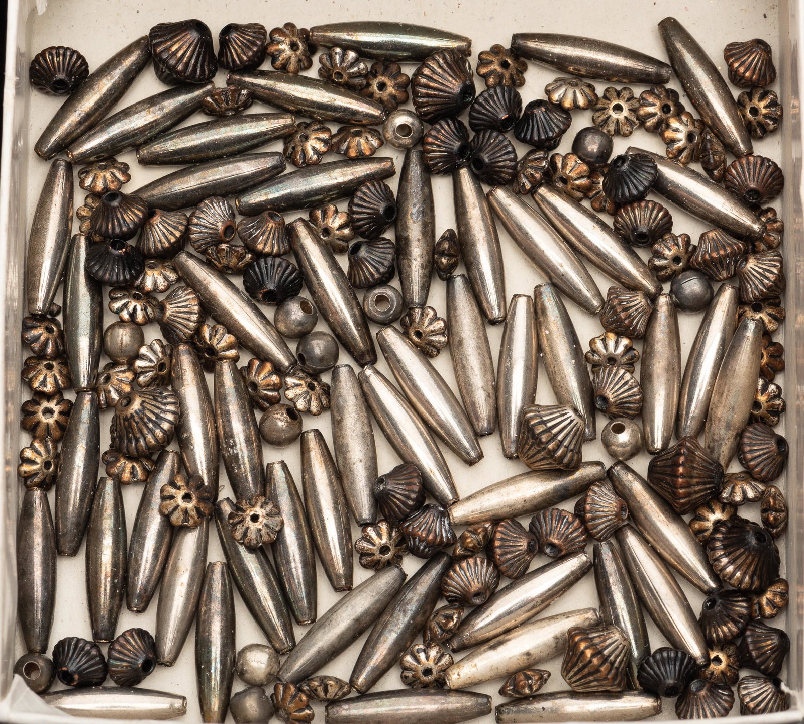 Mixed Silver Beads: 1/4" to 3/4" long. 1.7 ozt. IMPORTANT: Before bidding, please read the terms and conditions below. When you registered for the auction you agreed to these terms and will be required to comply with the