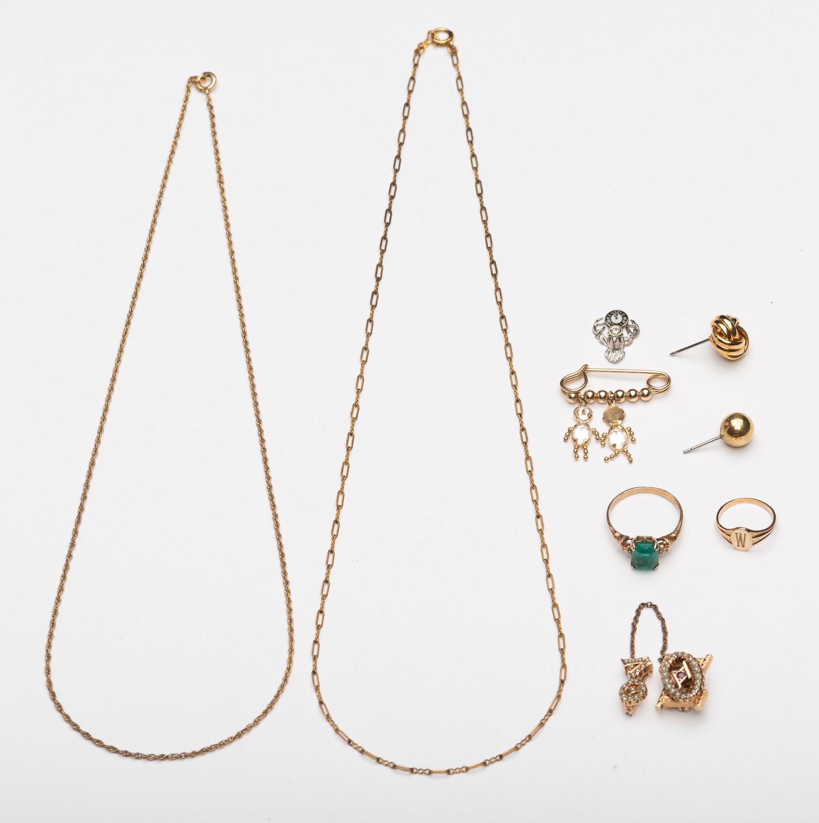 9 Pcs 10k Gold Jewelry: Tested 10k. Incl 2 single earrings, 2 pins, 2 necklaces & 2 rings. Rings sizes 1/2 & 5-1/2. 9.9 dwt. IMPORTANT: Before bidding, please read the terms and conditions below. When you registered for the