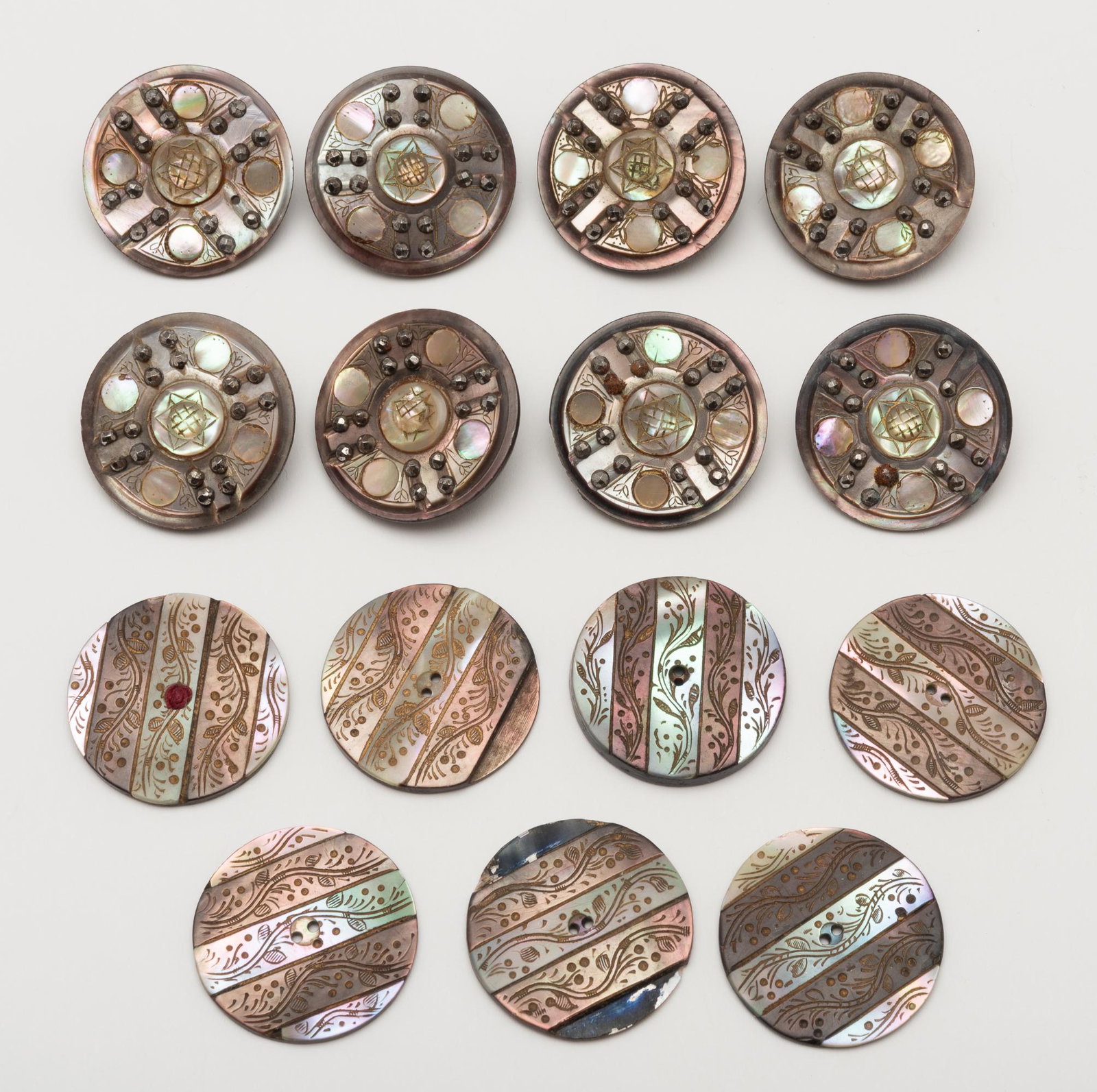 15 Victorian Buttons: Mother of pearl & marcasite inlay. 1". IMPORTANT: Before bidding, please read the terms and conditions below. When you registered for the auction you agreed to these terms and will be required to comp