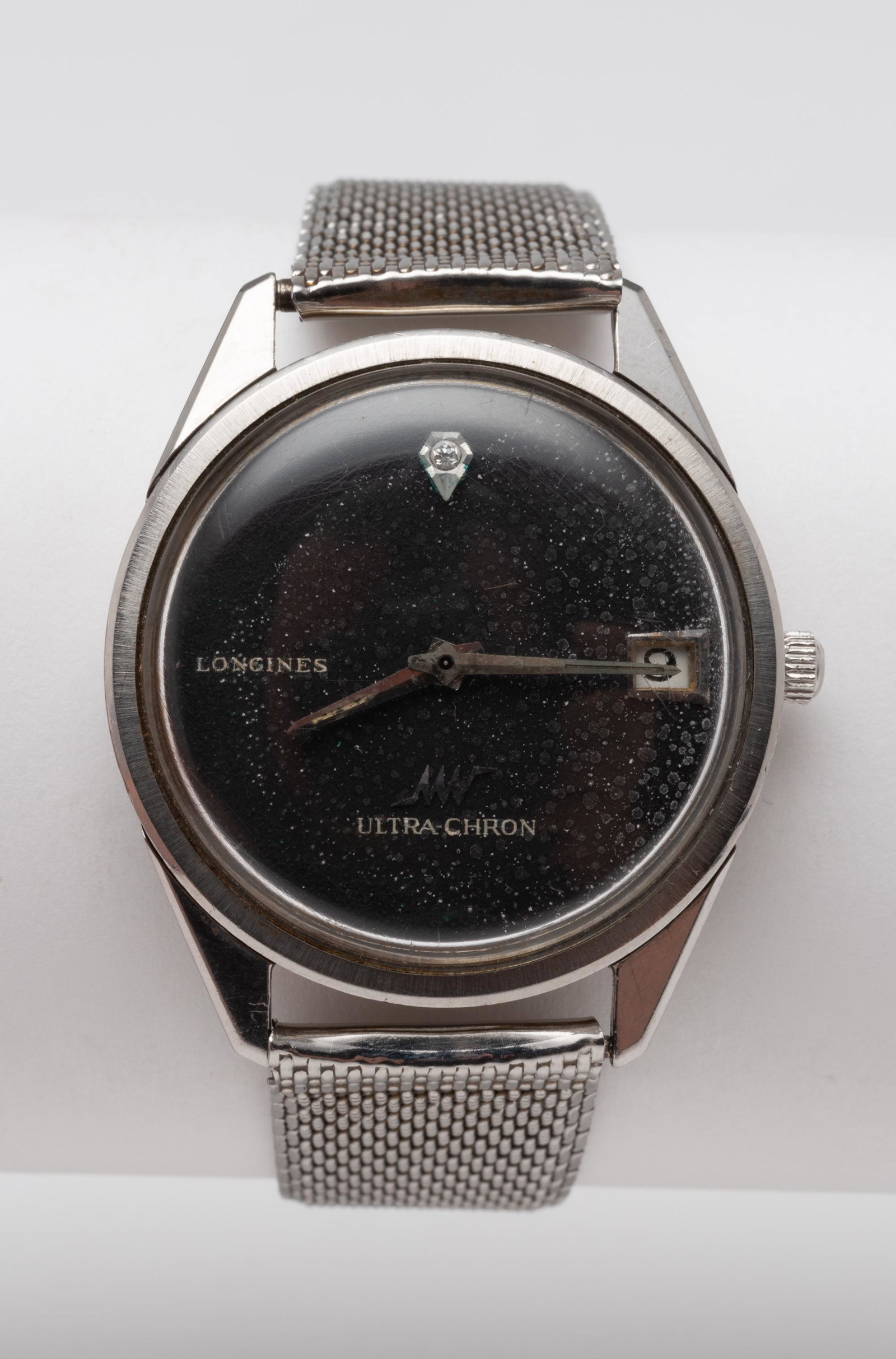 Longines Ultra Chron Wristwatch: Automatic. Stainless steel case. 1-5/8" lug to lug. Running. IMPORTANT: Before bidding, please read the terms and conditions below. When you registered for the auction you agreed to these terms and wi