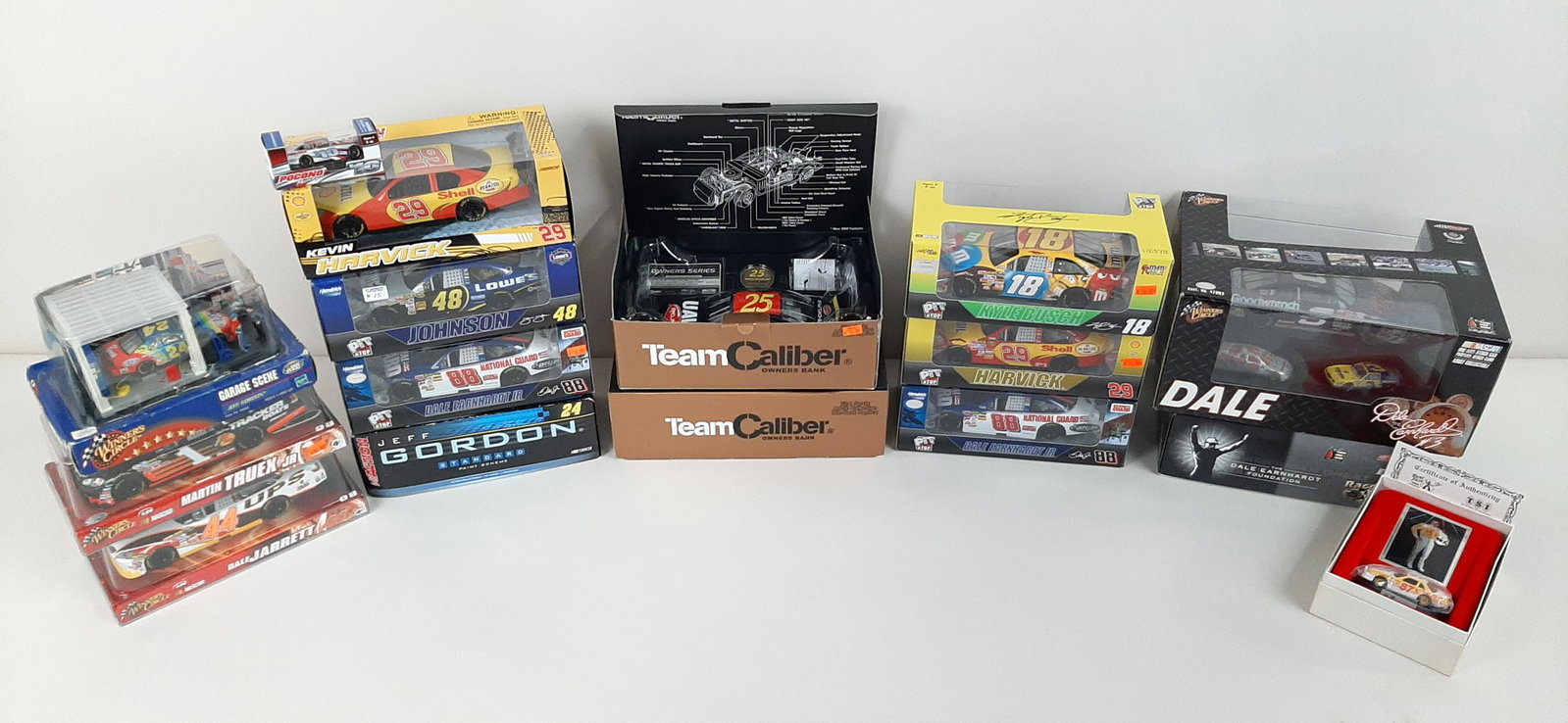 16 Die Cast Vehicles and Banks: Includes Dale Earnhardt and Jimmie Johnson. Various scales.