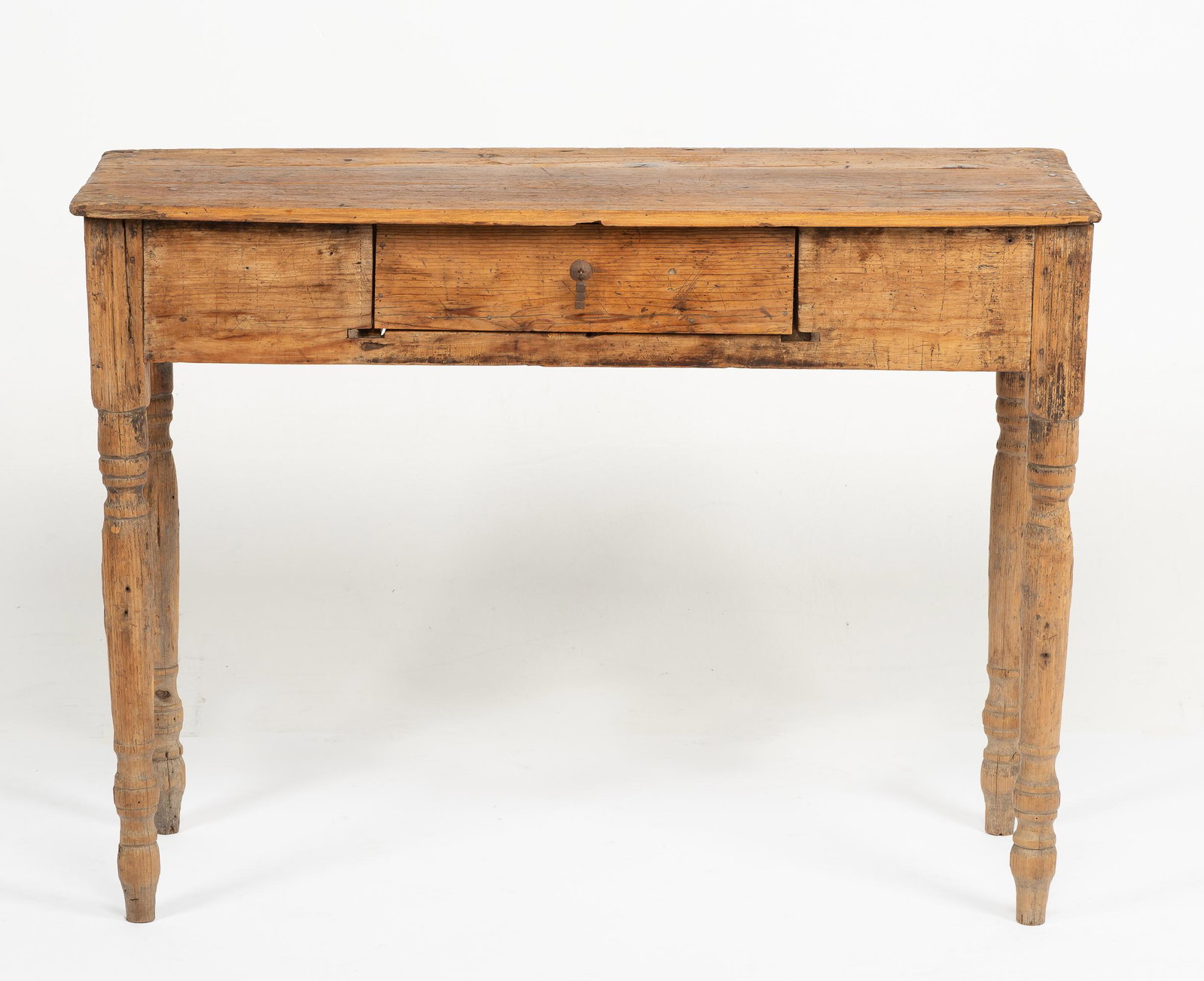 Mexican Console Table: Possibly cottonwood. Probably 19th century. Mortise, tenon and pin construction. No hardware. 30-1/2" high x 41-1/2" wide x 16-3/4" deep.