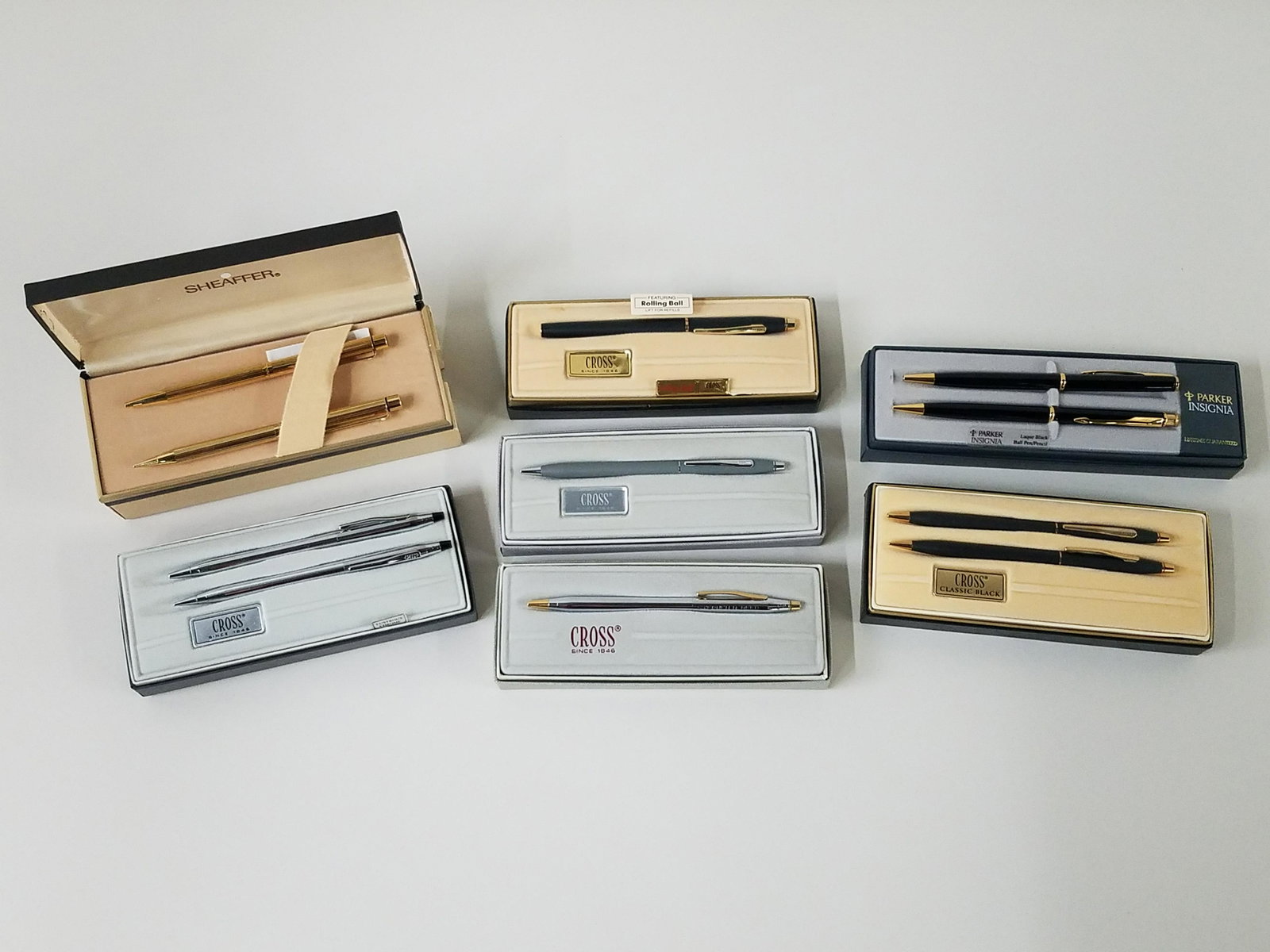 11 Executive Pens and Pencils: 7 sets totaling 11 pieces. Includes Cross, Sheaffer and Parker. 2 Cross pens engraved "Mayor Stephen Reed".