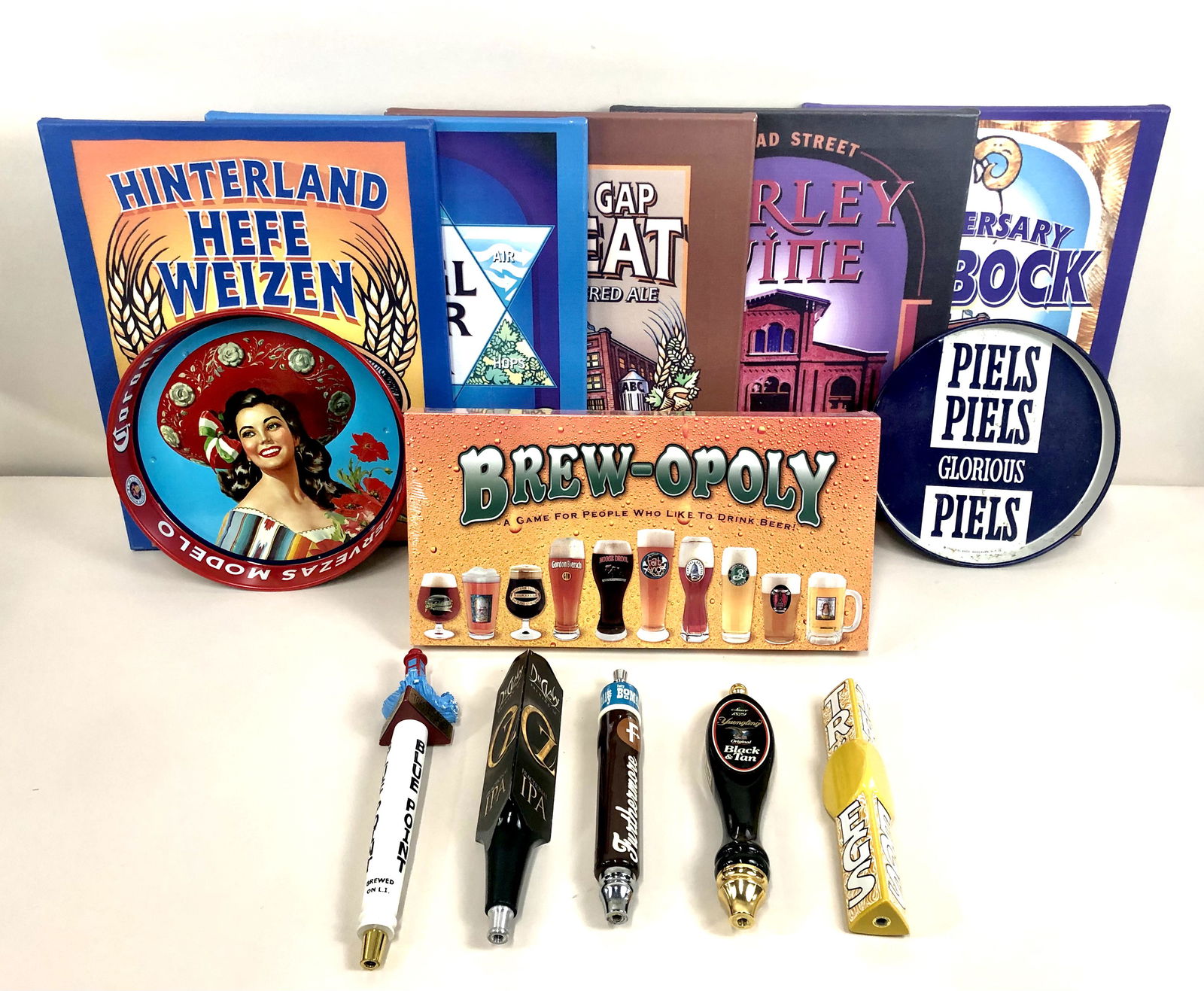 13 Pcs Breweriana: Including canvas-wrapped signs & tap handles.