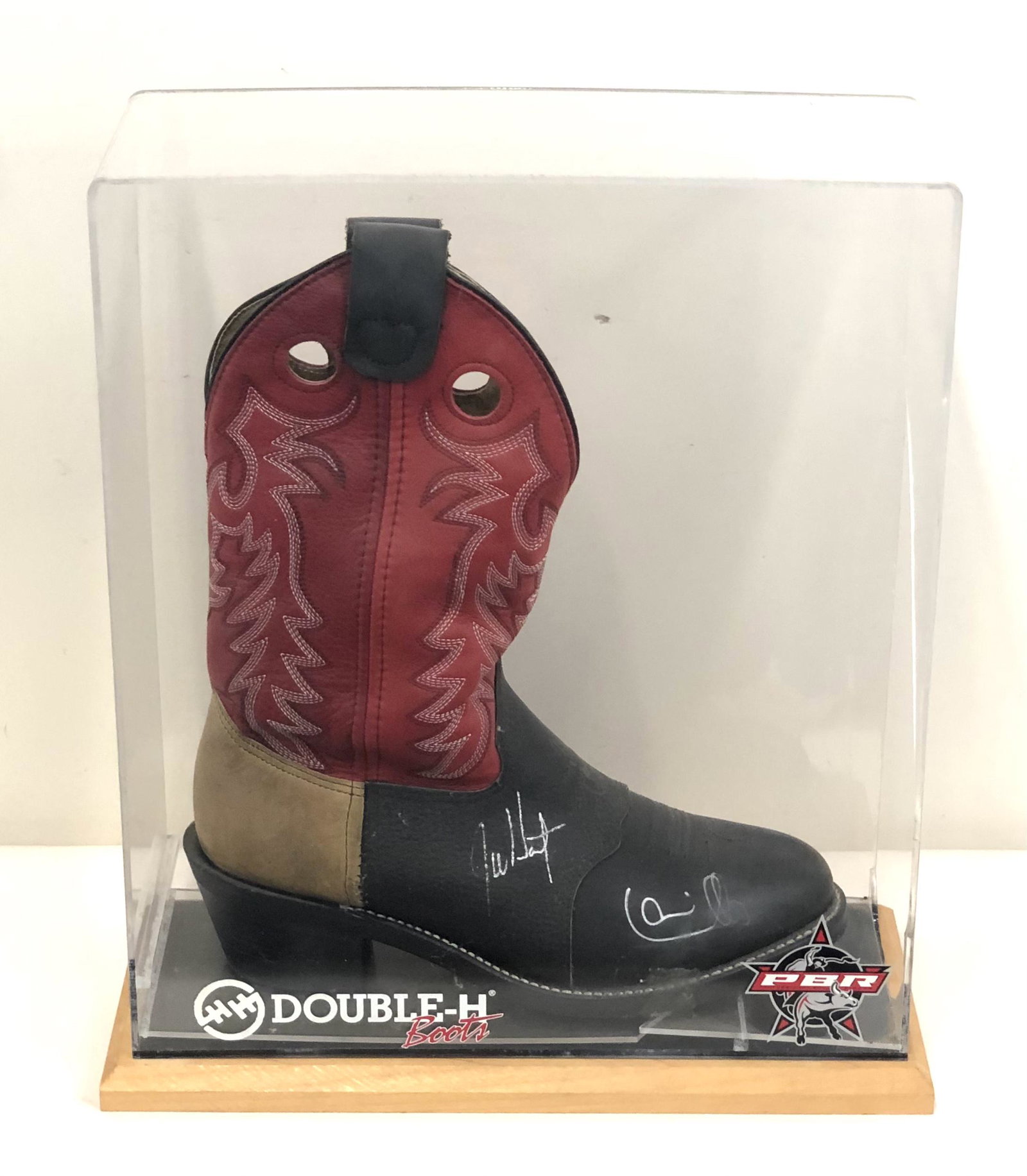 PBR Autographed Bill Riding Boot: 14 3/4" wide x 6" deep x 16 1/4" high. Loss to case.