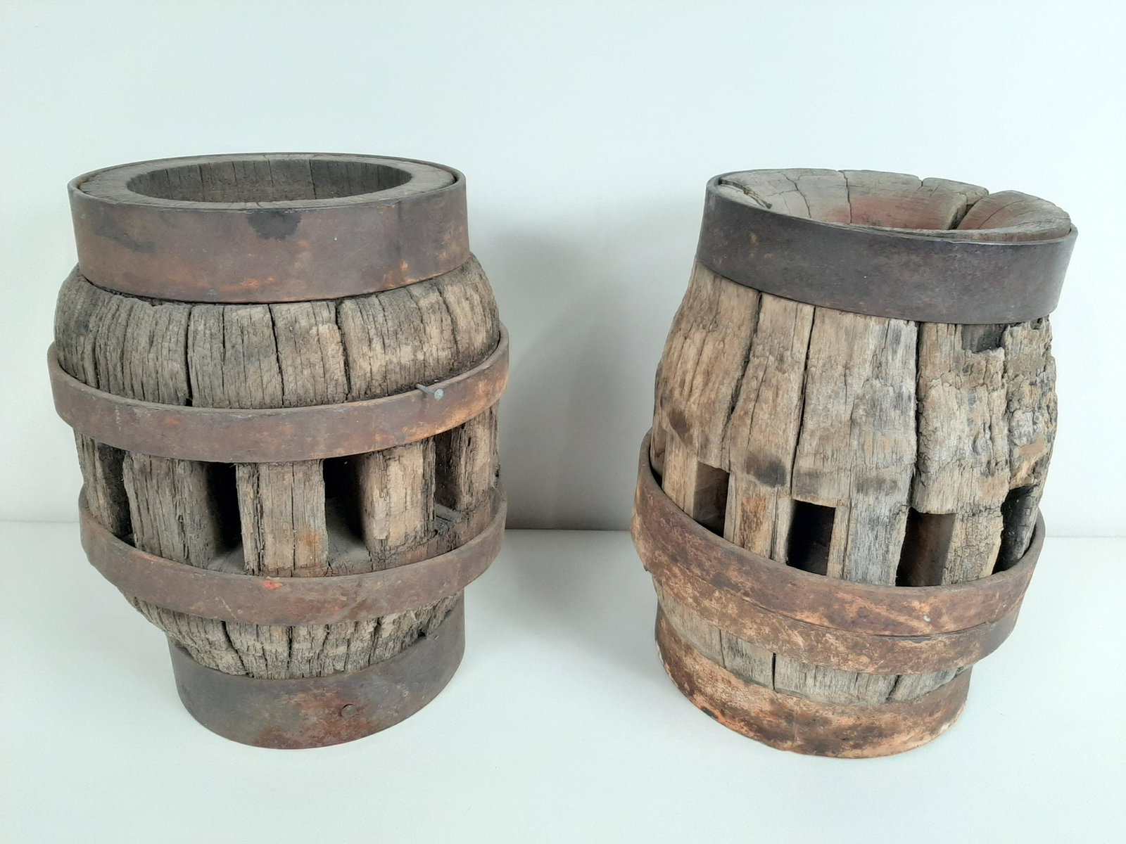 2 Wagon Wheel Hubs: 8" to 8 3/4" diameter X 11" high.