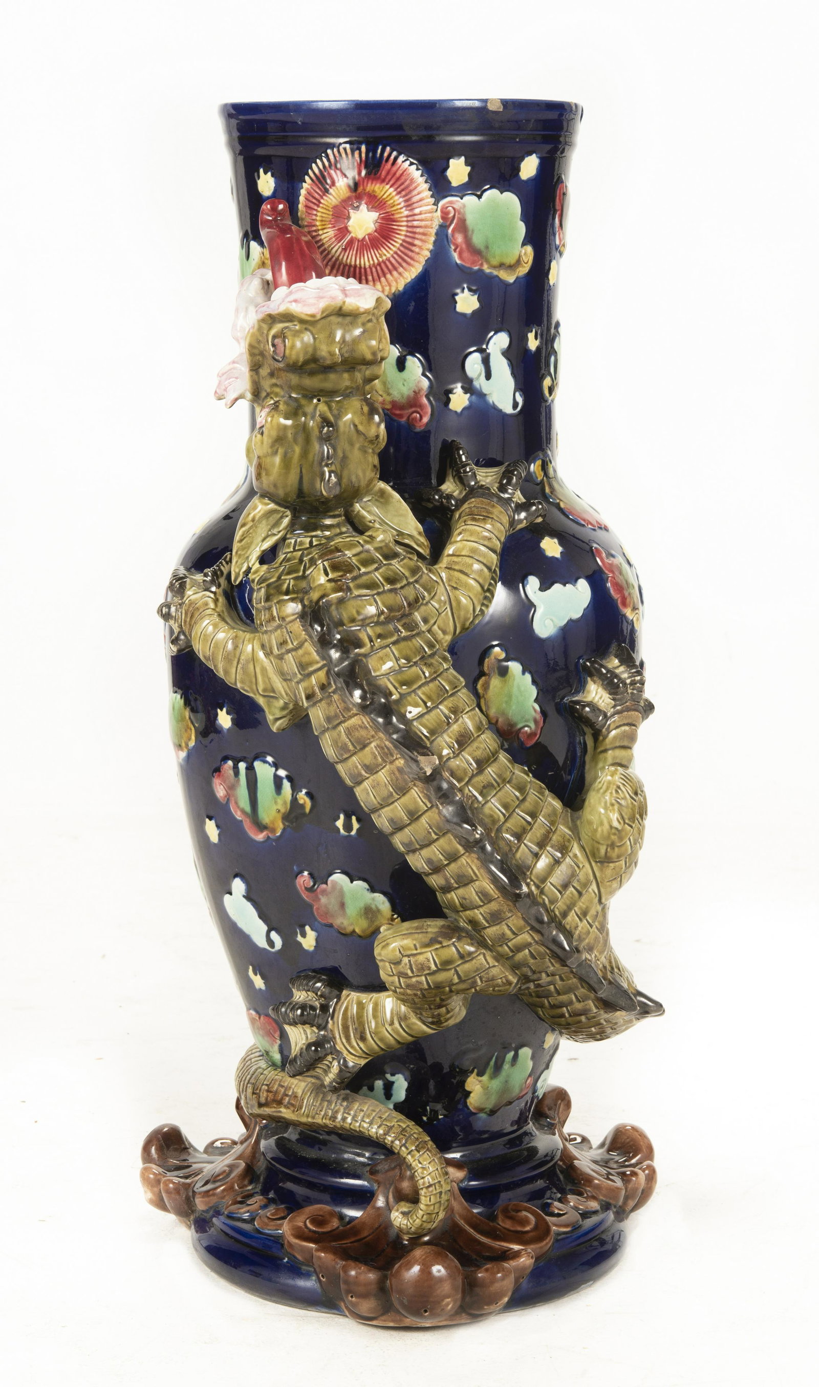 George Jones Majolica Dragon and Pearl Floor Vase: DESCRIPTION: George Jones Majolica dragon seeking a pearl floor vase. Cobalt ground with applied dragon among clouds pursuing a pearl. MEASUREMENTS: 15" wide x 12" deep x 27" high. CONDITION: Scattere