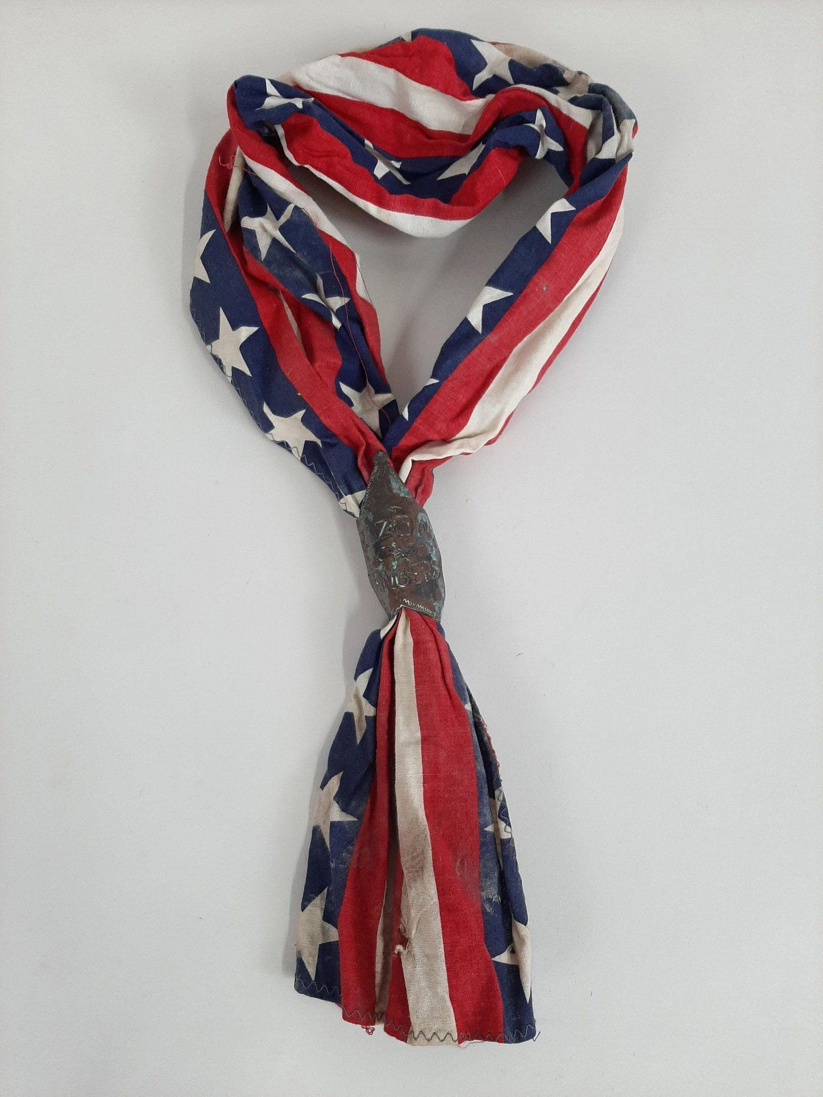 Patriotic Neckerchief with Arizona Rangers Badge: With note indicating they belonged to Navajo silversmith Stanley Lee.