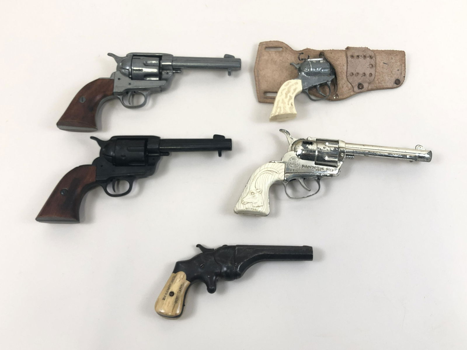 5 Toy & Replica Guns: Including Fanner Cap Gun. Overall 7" to 10" long.