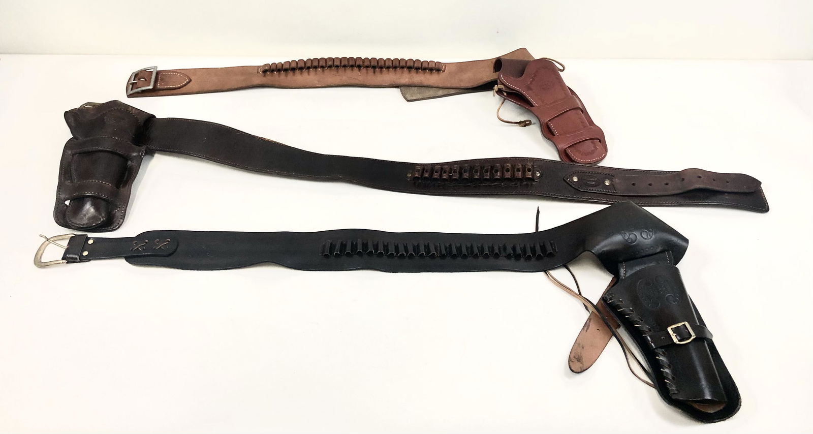 3 Gun Rigs Including Old World: Also includes WM Brown, Tombstone. 40" to 48" long.