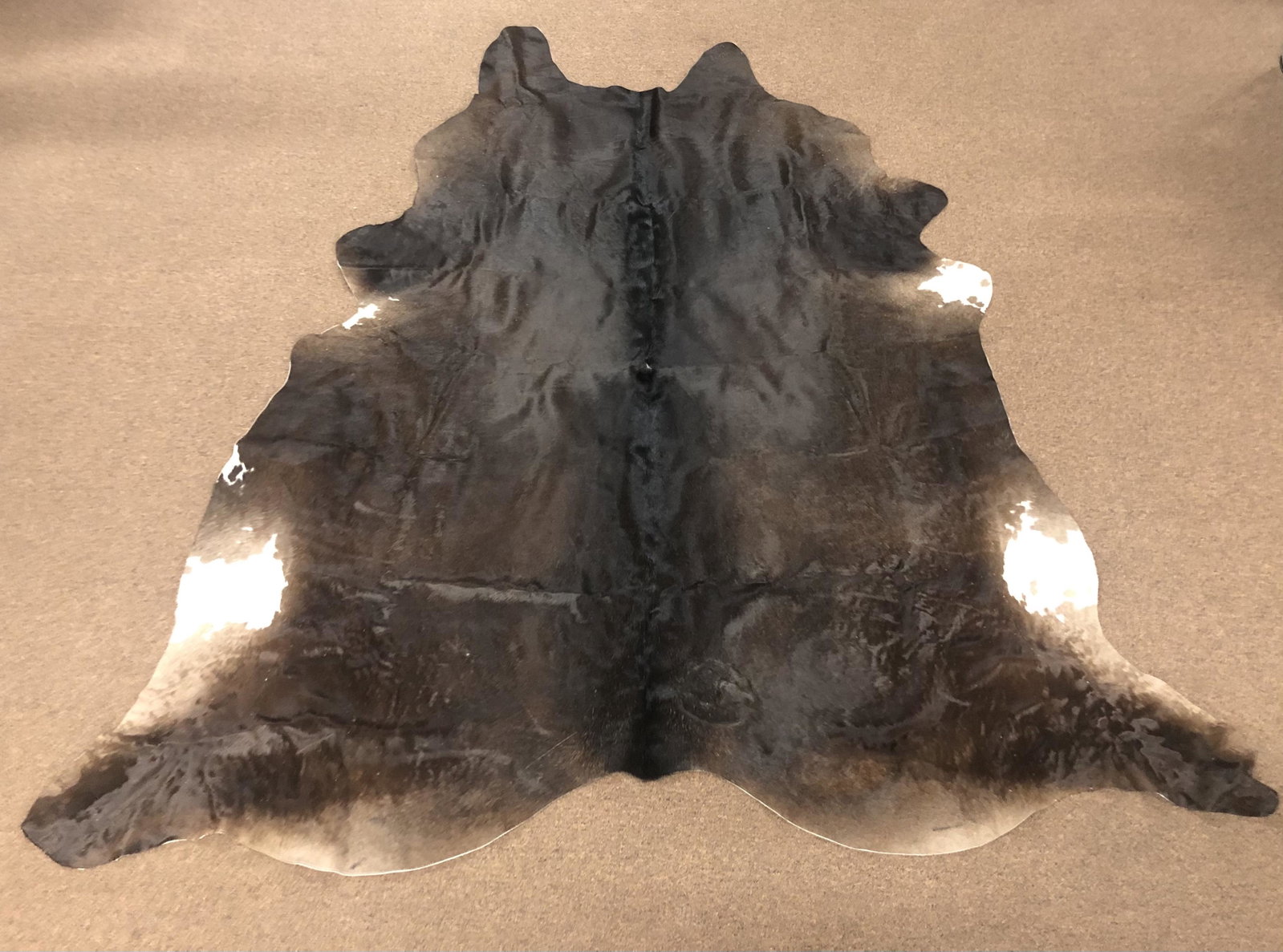 Cow Hide: 7' 8" long x 7' 6" wide.