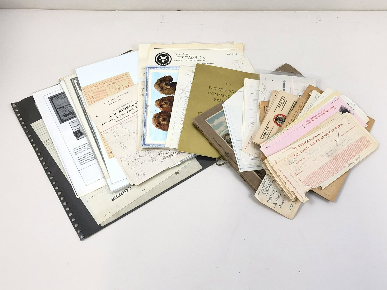 74 Pcs Colorado Ephemera: Includes checks, receipts, "Over the Rockies to the Top of the World," Frank Paxton Lumber Company calendars, and more.