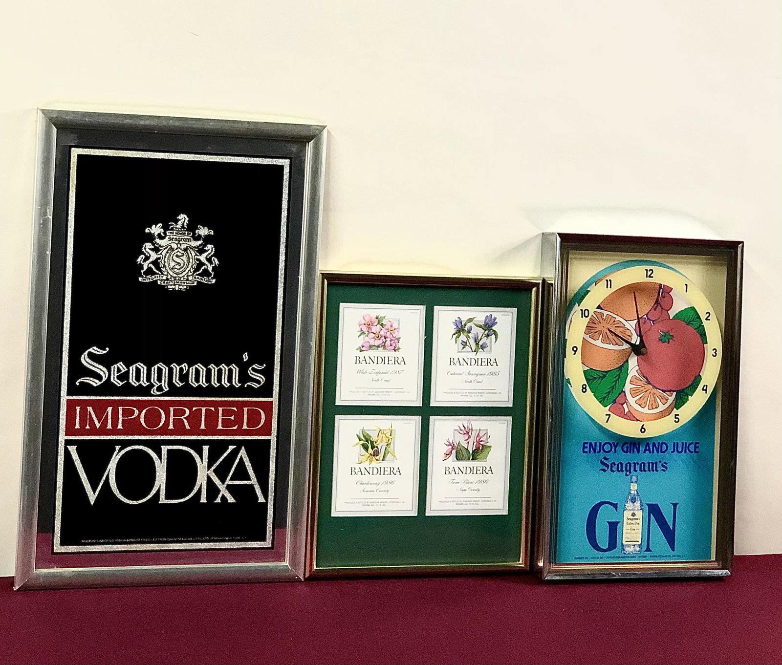 6 Wine and Liquor Advertising Prints & Mirrors: Includes Seagram's, Bandiera, Keller-Geister, and Cella. 14 1/2" to 21 1/2" high x 11 1/2" to 13 1/4" wide.