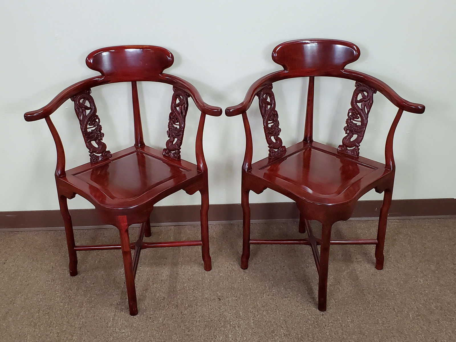 Pair of Chinese Rosewood Corner Chairs: 26 1/2" wide X 21 1/2" deep X 33" high.