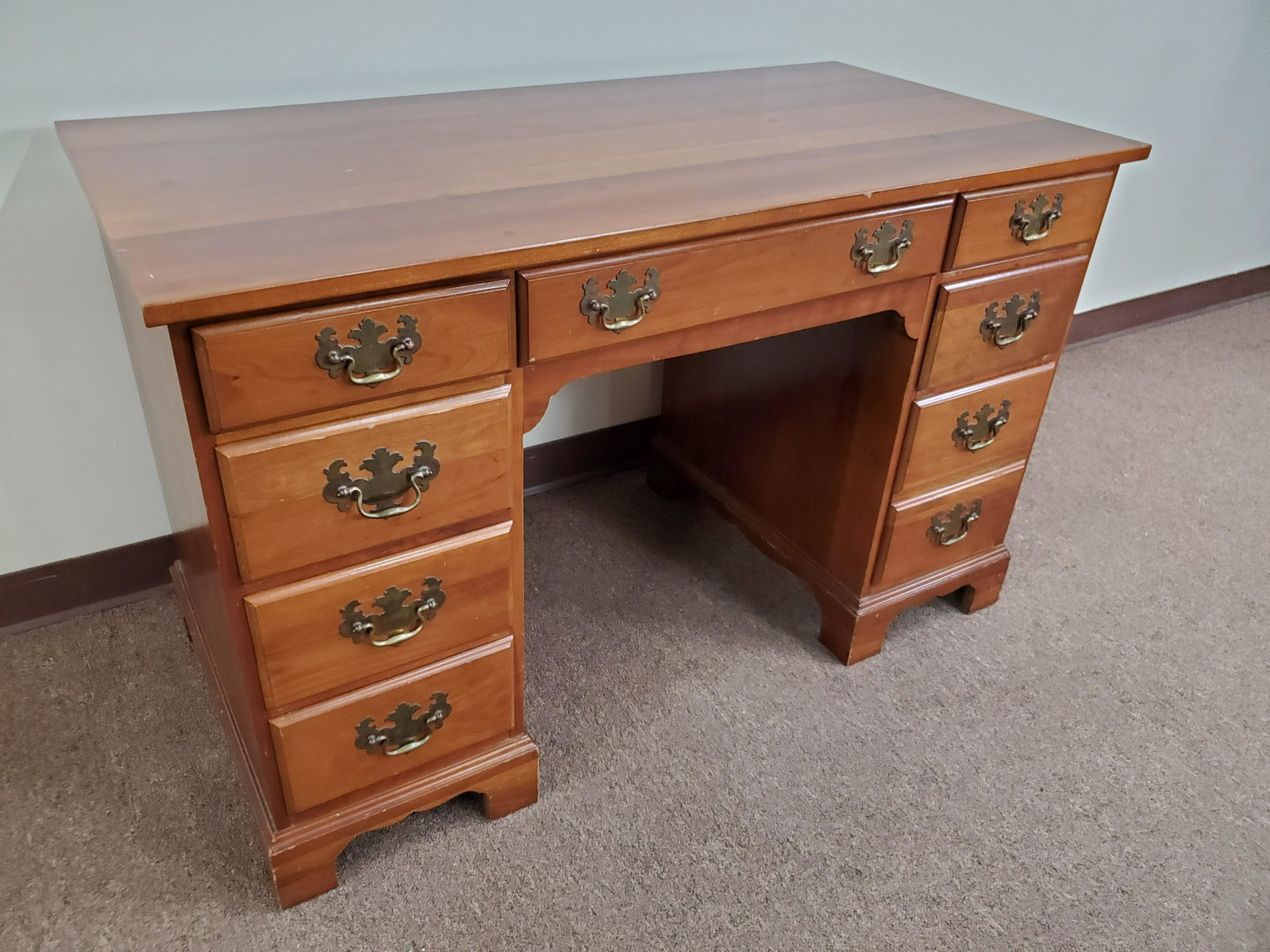 Knee Hole Desk: Unmarked. 46" wide X 23" deep X 29" high.