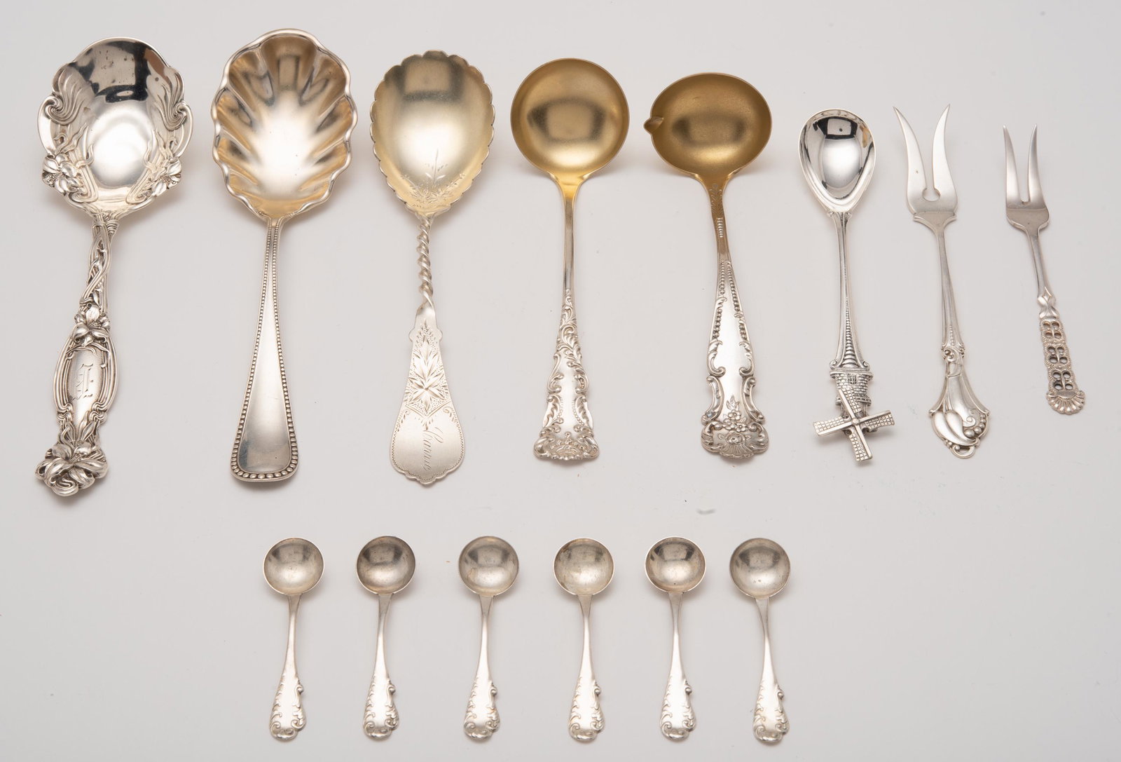 14 Sterling Flatware: 6 salts, 2 bouillon spoons, lemon fork, strawberry fork, egg spoon, dessert spoon, jelly spoon, and salad spoon. 2 1/4" x 6 1/4" long. 8.2 ozt. IMPORTANT: Before bidding, please read the terms and con