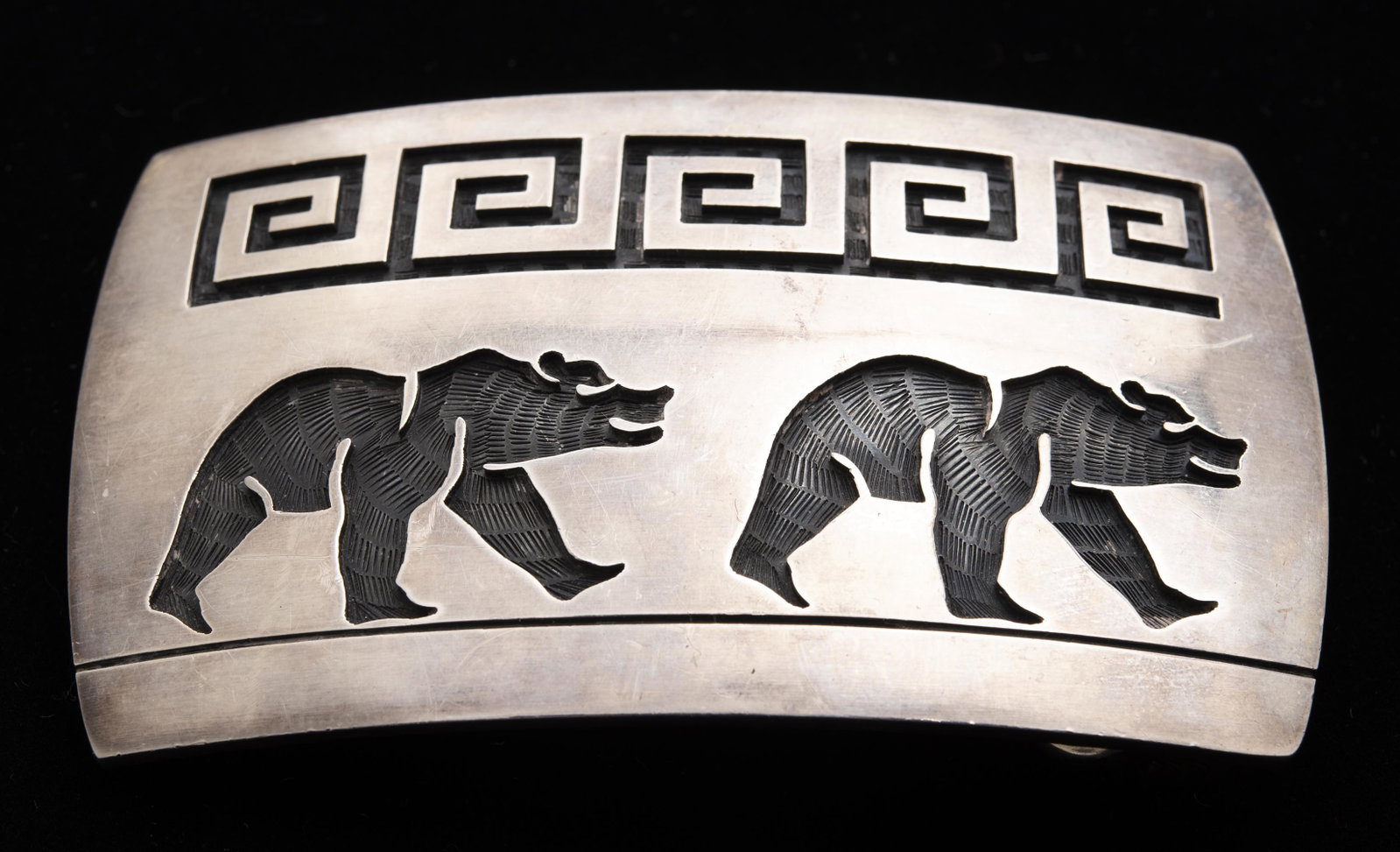 Saufkie Sterling Figural Bear Belt Buckle: Marked "Saufkie Sterling". Buckle 3-3/8" x 2". 1.9 ozt. IMPORTANT: Before bidding, please read the terms and conditions below. When you registered for the auction you agreed to these terms and will be