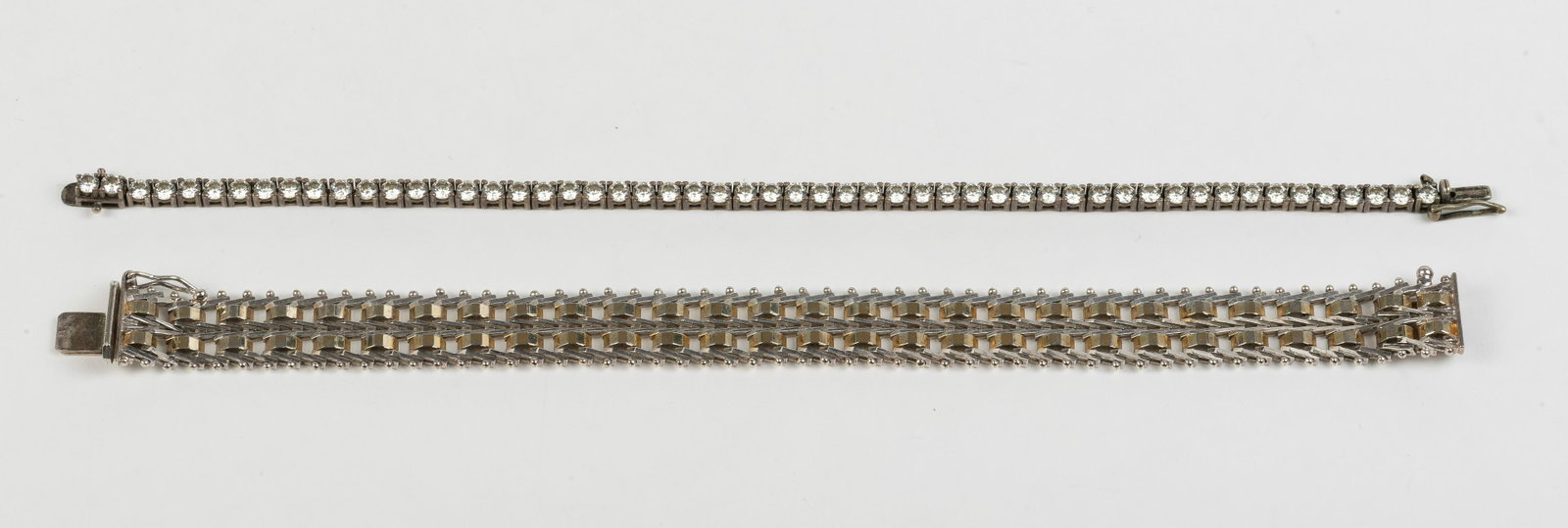 2 Sterling Bracelets: Milor, Italy and Korea. Each 7" long. IMPORTANT: Before bidding, please read the terms and conditions below. When you registered for the auction you agreed to these terms and will be required to compl
