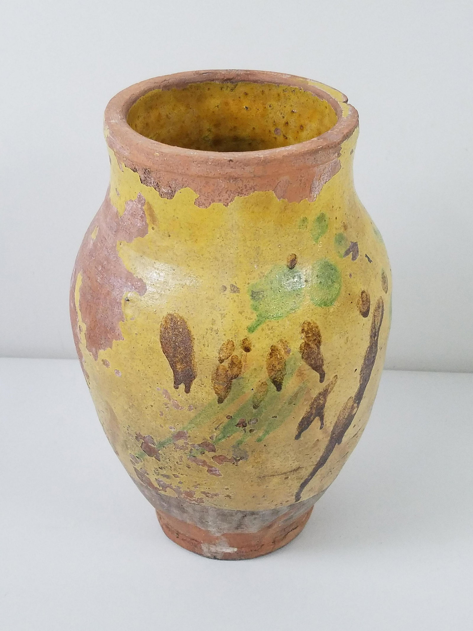Redware Vessel: 7-3/4" diameter x 12-1/2" high. Some losses.