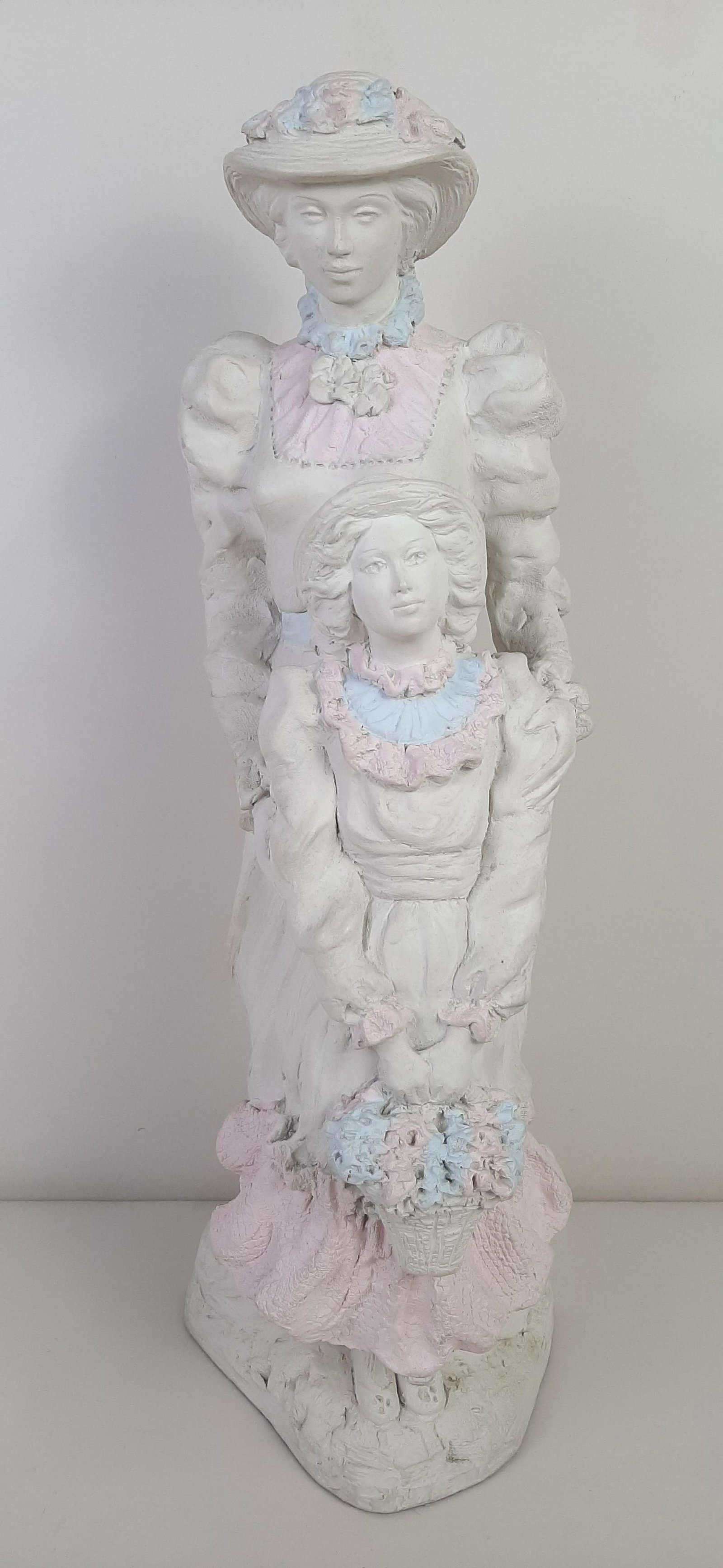 Austin Productions Mother and Child Sculpture: Signed Alice Heath and dated 1988. 7" wide X 10" deep X 21" high.