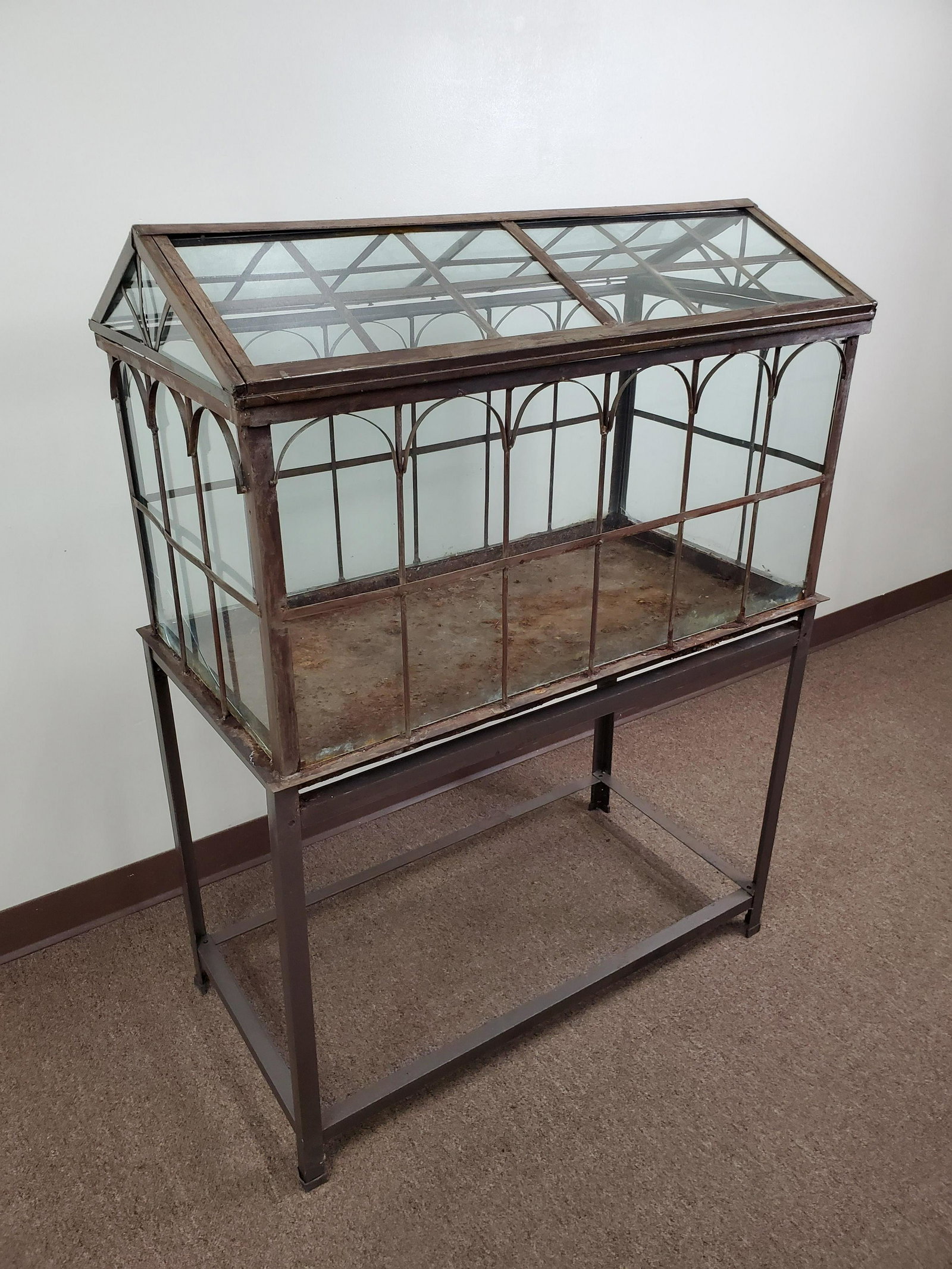 Wardian Terrarium: 35 1/4" wide X 18 1/2" deep X 47" high. Some rust and broken glass panels.