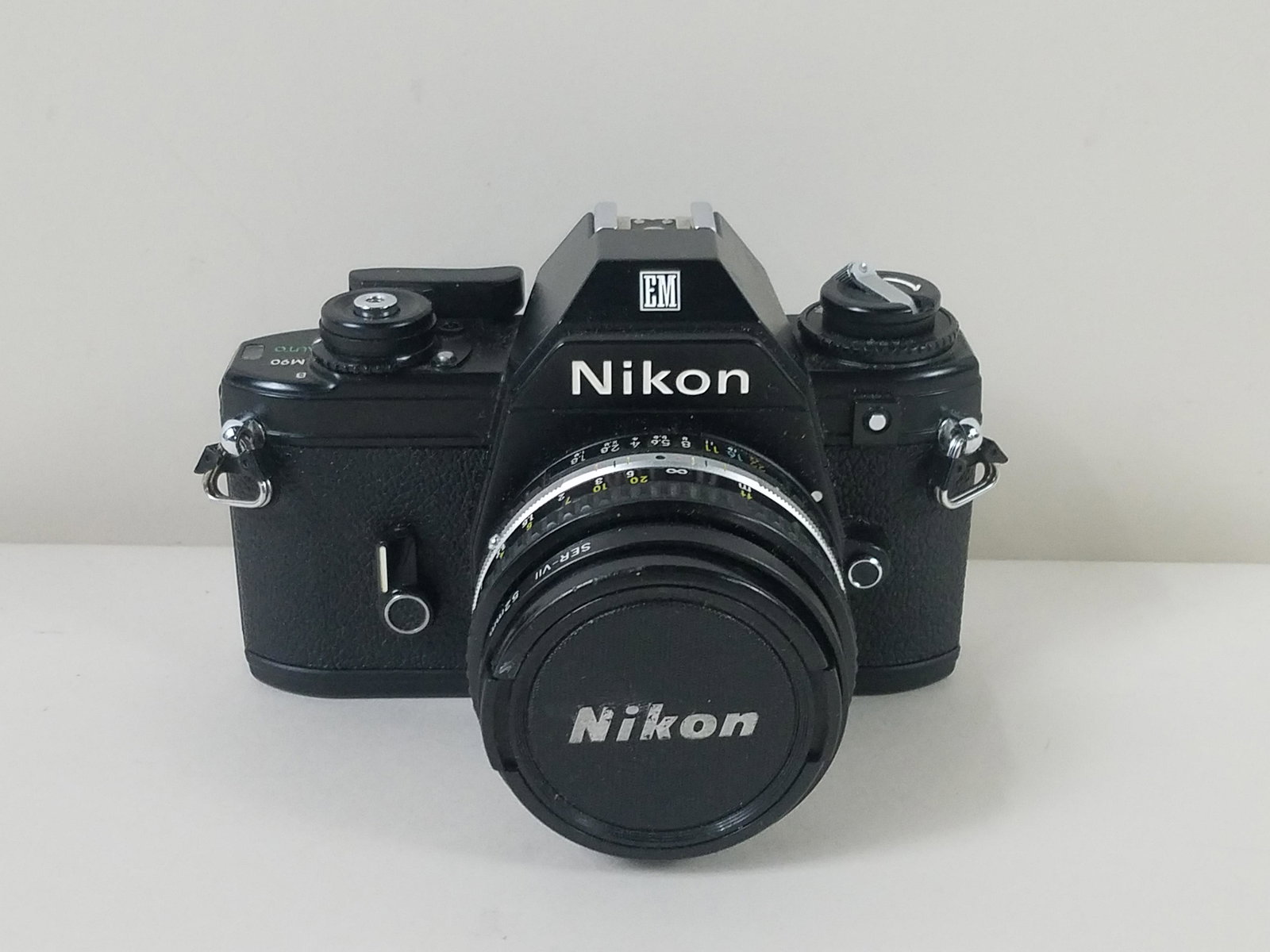 Nikon EM Film Camera with 52mm Lens: Made in Japan.