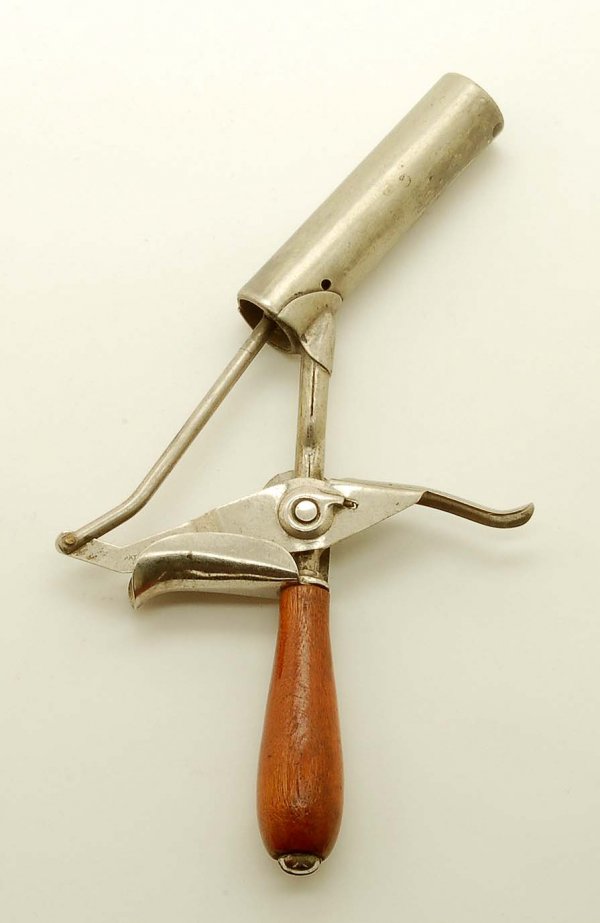 Fisher Motor Cylindrical Ice Cream Disher: DESCRIPTION: Cylindrical/tubular ice cream disher marked "Made in Canada". PROVENANCE: Property from the collection of Charles D. Morris, Mechanicsburg, Pennsylvania, a collector of ice cream memorabi
