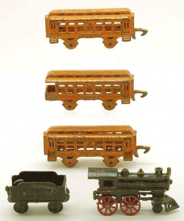 Hubley Cast Iron Floor Train Passenger Set: DESCRIPTION: Hubley painted cast iron floor train passenger set. Black painted 4-4-0 locomotive with red painted spoke wheels and "P.R.R." tender. Three orange painted "America" passenger cars. MEASUR