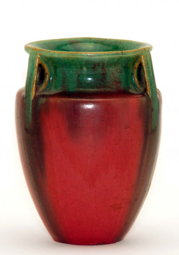 Fulper Art Pottery Bullet Vase: DESCRIPTION: A Fulper art pottery bullet vase. Baluster form with three integrated handles in graduating green to mauve glaze. Marked "Fulper" under base. MEASUREMENTS: 6-3/4". CONDITION: Minor bruise