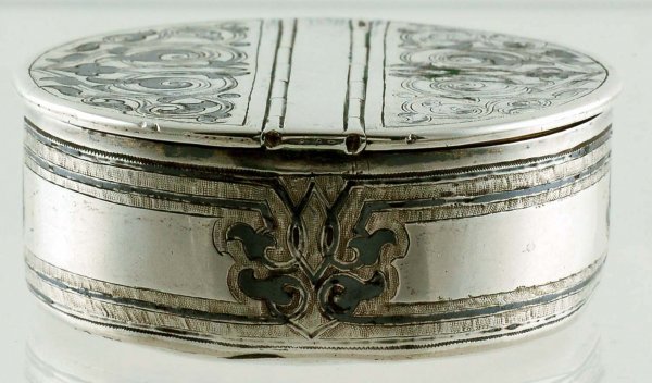 19th Century Russian Silver Niello Pill Box: DESCRIPTION: A Russian silver and niello pill box. Round in shape with double hinged lid, gilt interior and overall niello scrolled decoration. Marked with Viktor Savinkov (Moscow) assayer's mark "BC 
