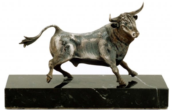 Silver Sculpture of a Bull on Marble Base: DESCRIPTION: A silver sculpture of a bull mounted on a black marble base. Marked to tail with a star in a circle and monogram mark that appears to be "FJ". MEASUREMENTS: 5" x 3-1/4" on a 6-3/8" x 2-3/