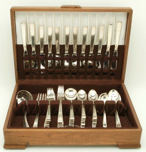 82 Piece Towle Old Lace Sterling Flatware Set: DESCRIPTION: A Towle Old Lace eight-two piece sterling silver flatware set. Marked "Towle Sterling Old Lace" with hallmark. Includes four 9" and eight 8-3/4" sterling handled knives, twelve 7-1/2" din