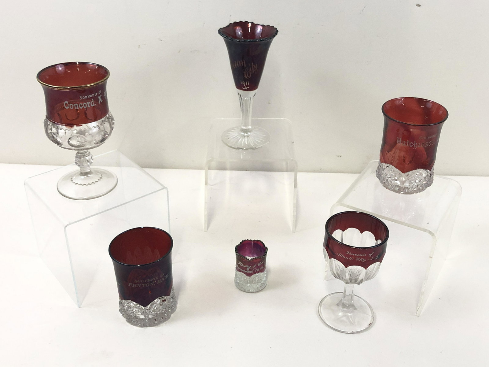 6 Pcs Souvenir Glasses: Includes Concord, New Hampshire; Ocean City, 1911; Atlantic City, New Jersey; Fenton, Michigan; and Hutchinson, Kansas; 2 1/4" to 6 1/4" high.