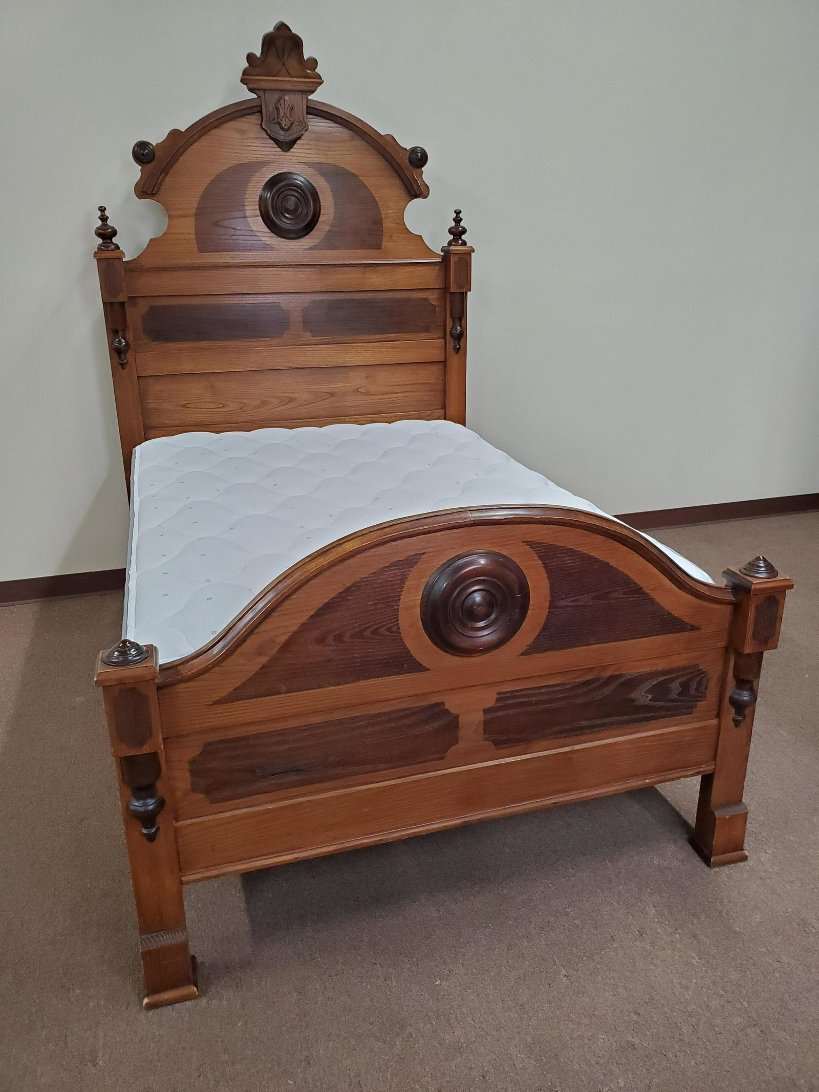 Victorian Bed: 52 1/2" wide X 74" deep X 71" high. Comes with mattress and box spring.